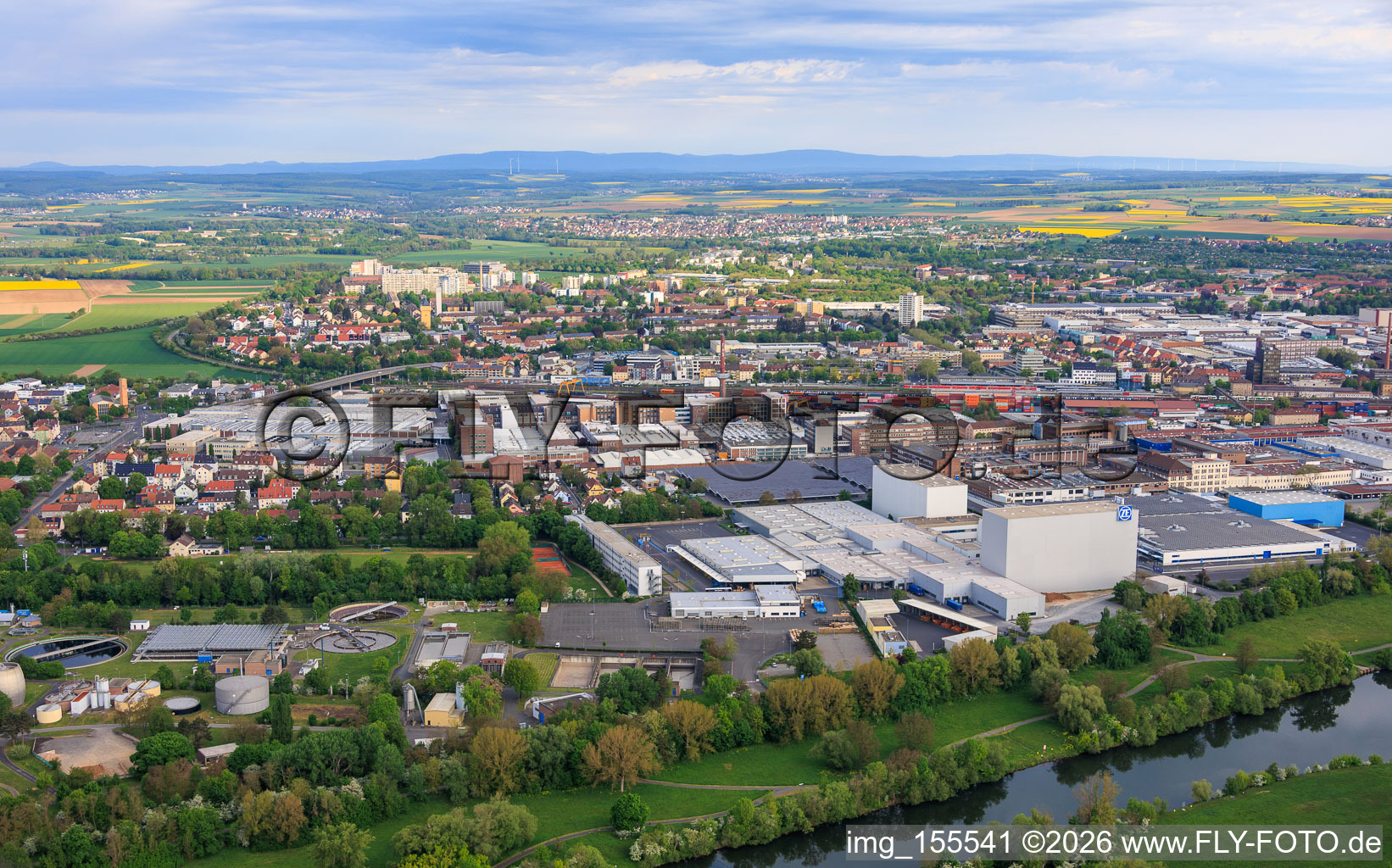 City view across the Main River from the southeast, showing ZF Friedrichshafen AG - North Plant in the district Oberndorf in Schweinfurt in the state Bavaria, Germany