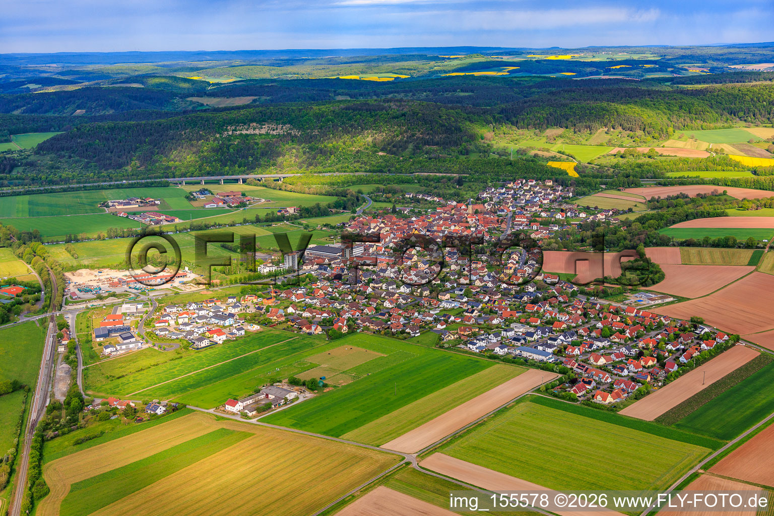 View of the town from the east, this side of the A7 motorway, with the Saale Valley Bridge. in Elfershausen in the state Bavaria, Germany