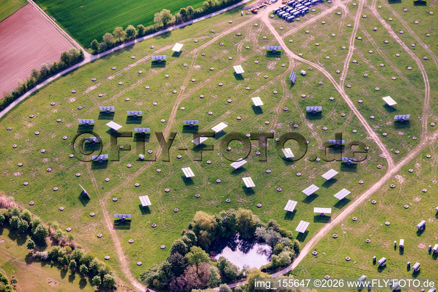 Construction site for the dismantling of the movers at the Gut Erlasee solar park with sun-tracking panels in the district Büchold in Arnstein in the state Bavaria, Germany