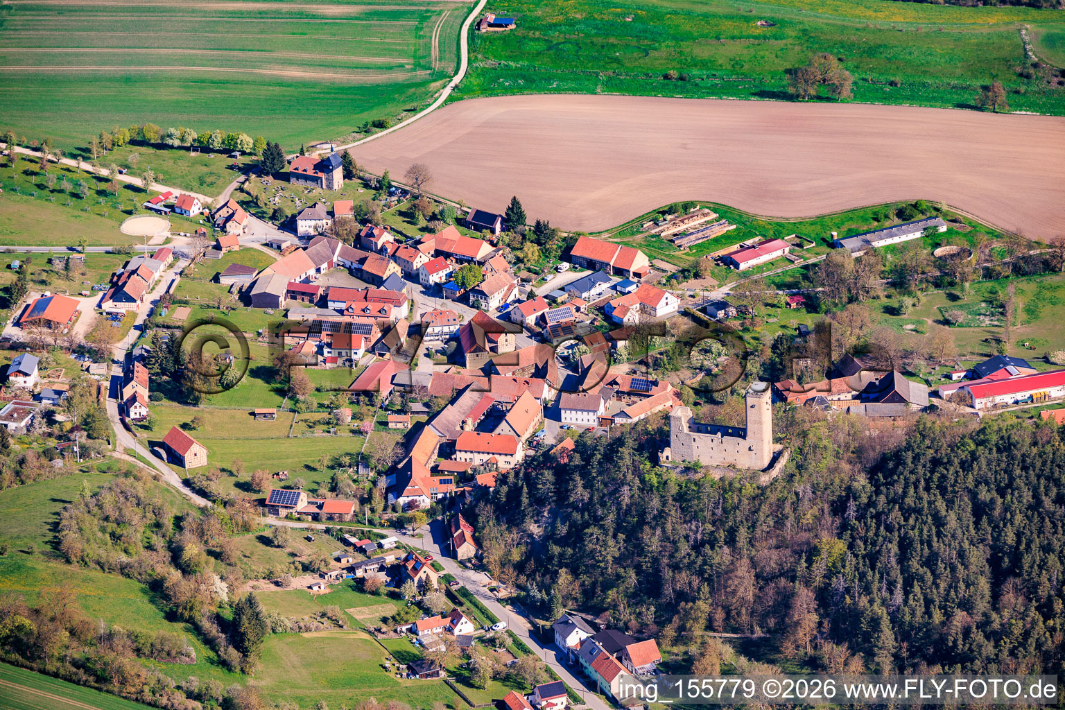 Village view from the south with castle ruins Ehrenstein in the district Ehrenstein in Stadtilm in the state Thuringia, Germany