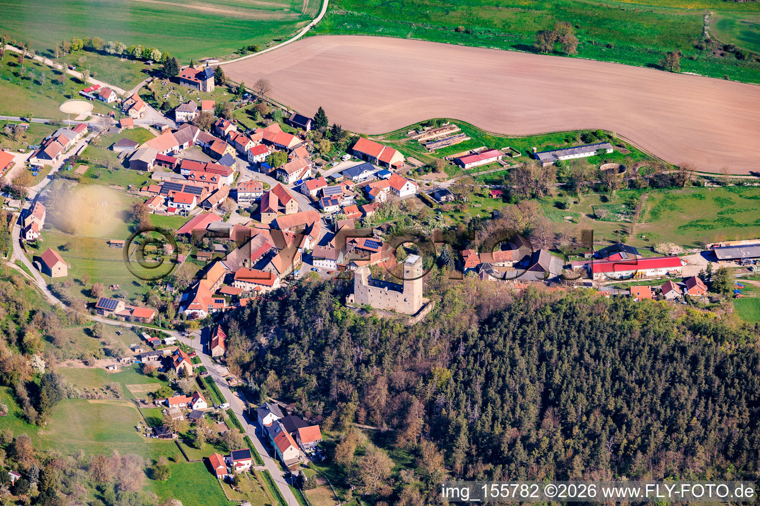 Village view from the south with castle ruins Ehrenstein in the district Ehrenstein in Stadtilm in the state Thuringia, Germany