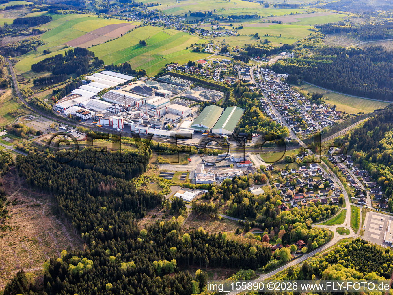 Industrial park at the train station with Wiegand-Glashüttenwerke GmbH and Bayerische Flaschen-Glashüttenwerke Vertriebs-GmbH in Steinbach am Wald in the state Bavaria, Germany