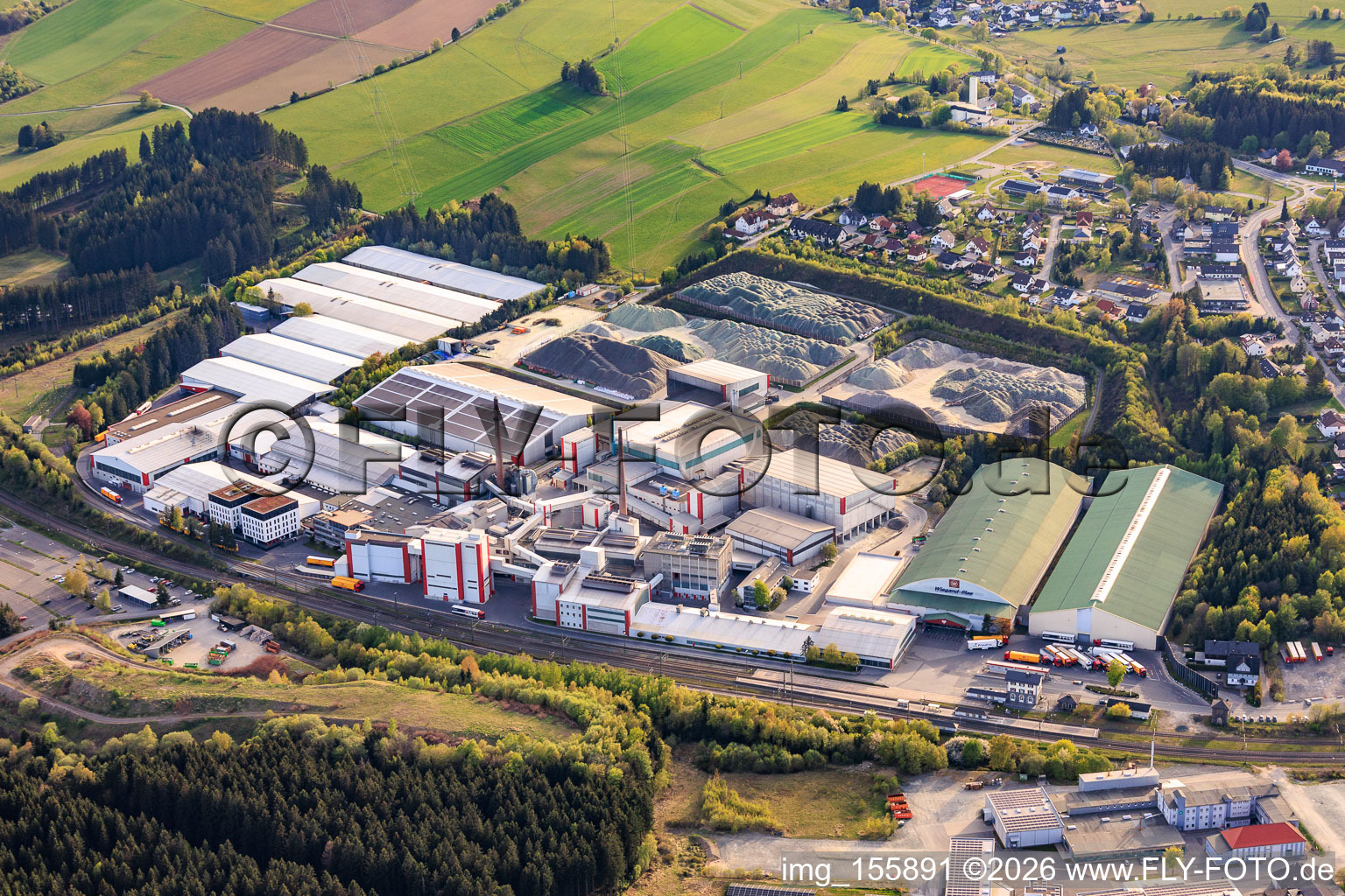 Industrial park at the train station with Wiegand-Glashüttenwerke GmbH and Bayerische Flaschen-Glashüttenwerke Vertriebs-GmbH in Steinbach am Wald in the state Bavaria, Germany