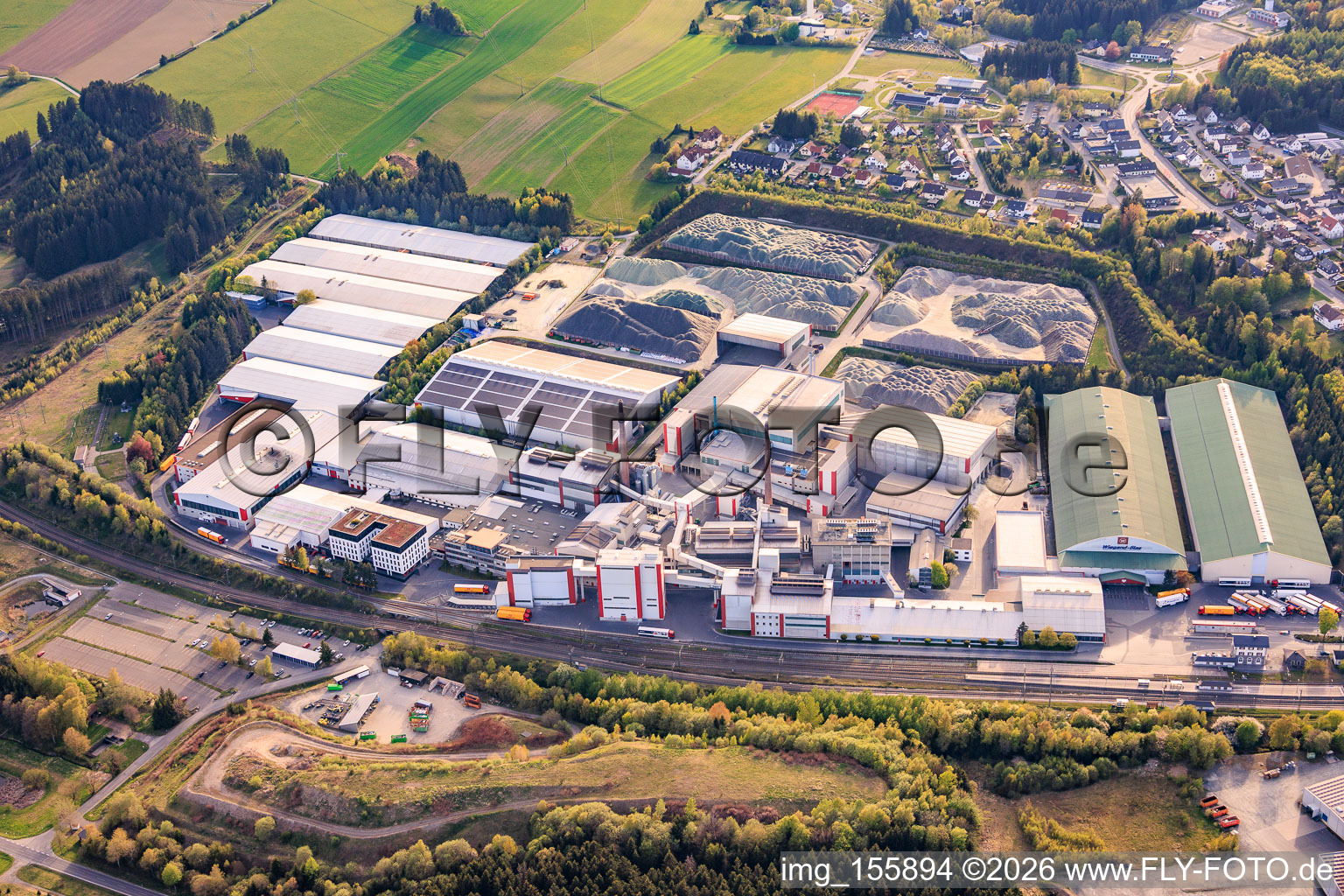 Industrial park at the train station with Wiegand-Glashüttenwerke GmbH and Bayerische Flaschen-Glashüttenwerke Vertriebs-GmbH in Steinbach am Wald in the state Bavaria, Germany