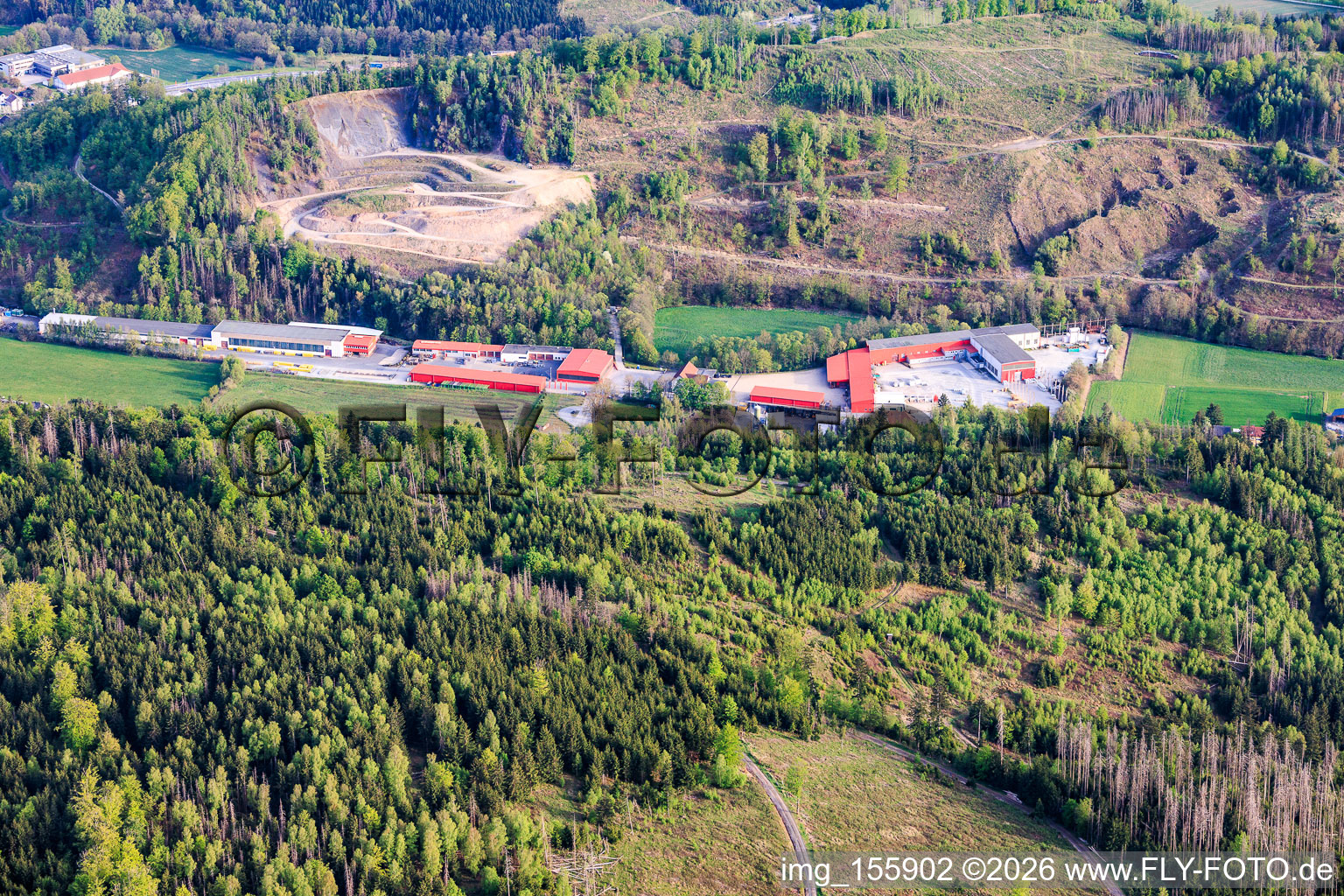 Industrial area to the left of State Road 220 with Max Frank Pressig GmbH in Pressig in the state Bavaria, Germany