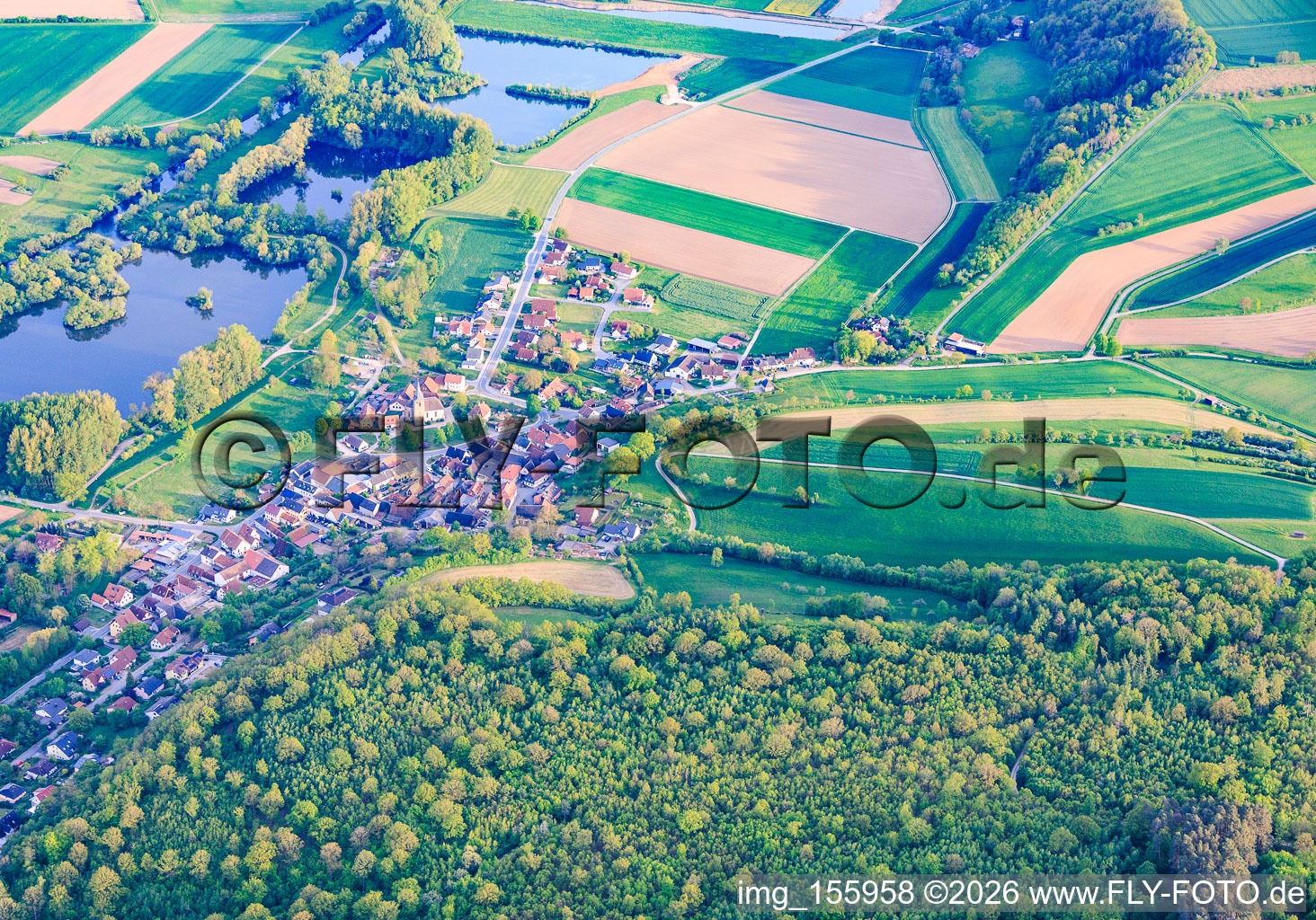 Village view from the north with Wiesner Wörthsee and Bergmannsee in the district Wiesen in Bad Staffelstein in the state Bavaria, Germany