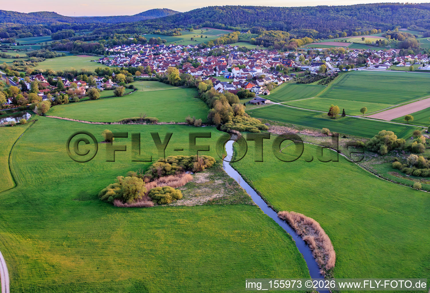 Course of the Baunach river to the southwest in Reckendorf in the state Bavaria, Germany