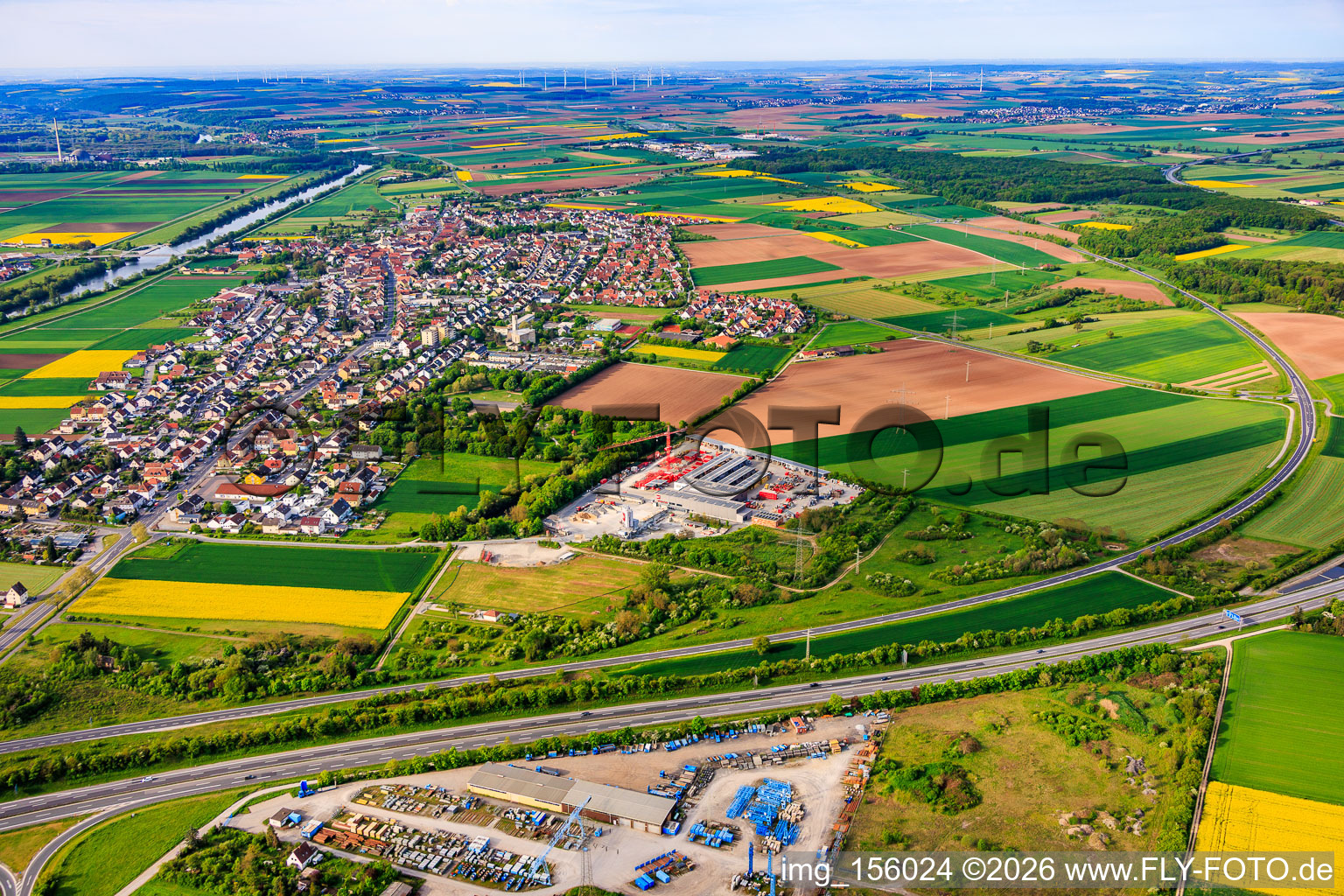 View of the town from the north, beyond the A70 motorway in Bergrheinfeld in the state Bavaria, Germany