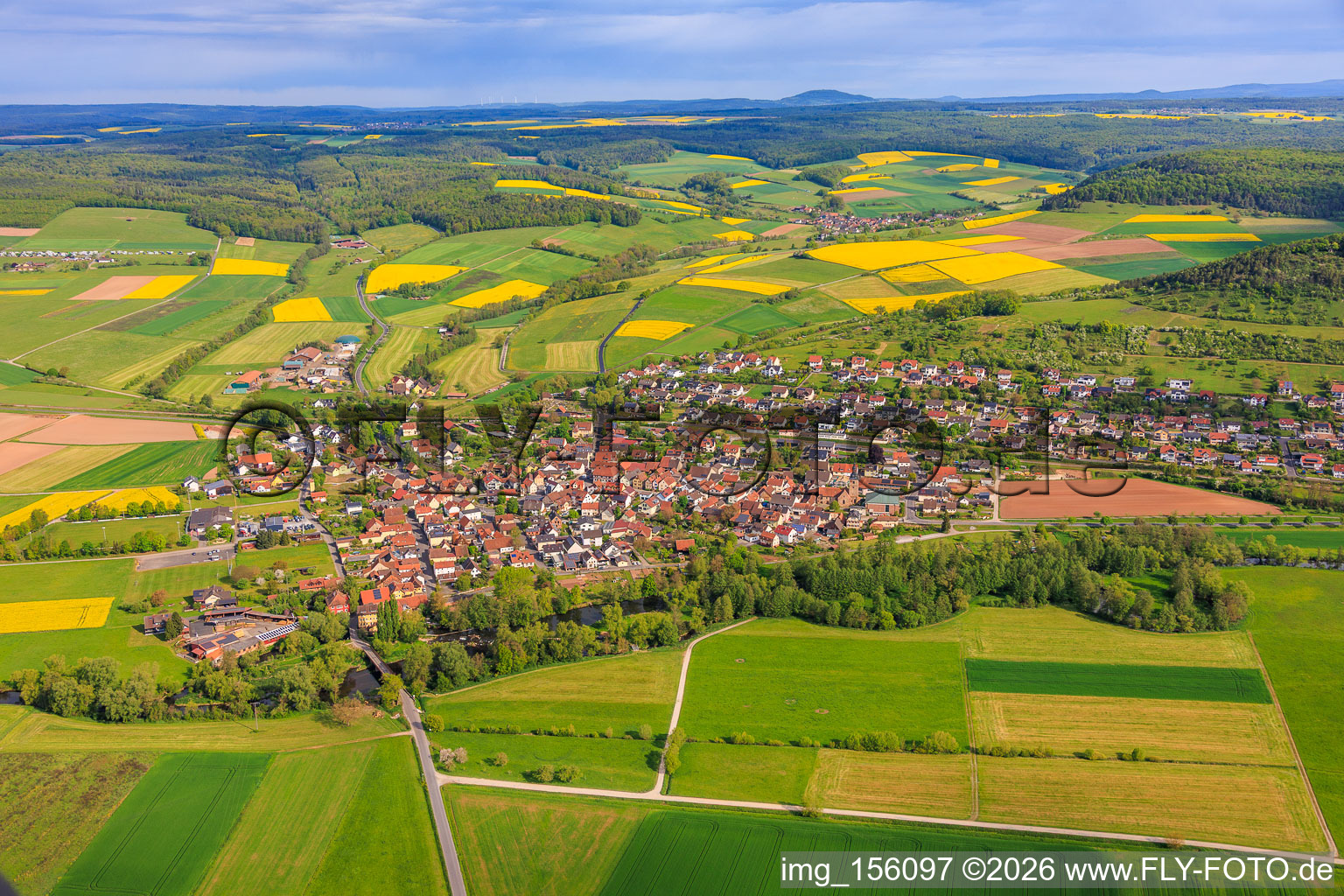 Village view in the valley of the Franconian Saale from the south in the district Diebach in Hammelburg in the state Bavaria, Germany