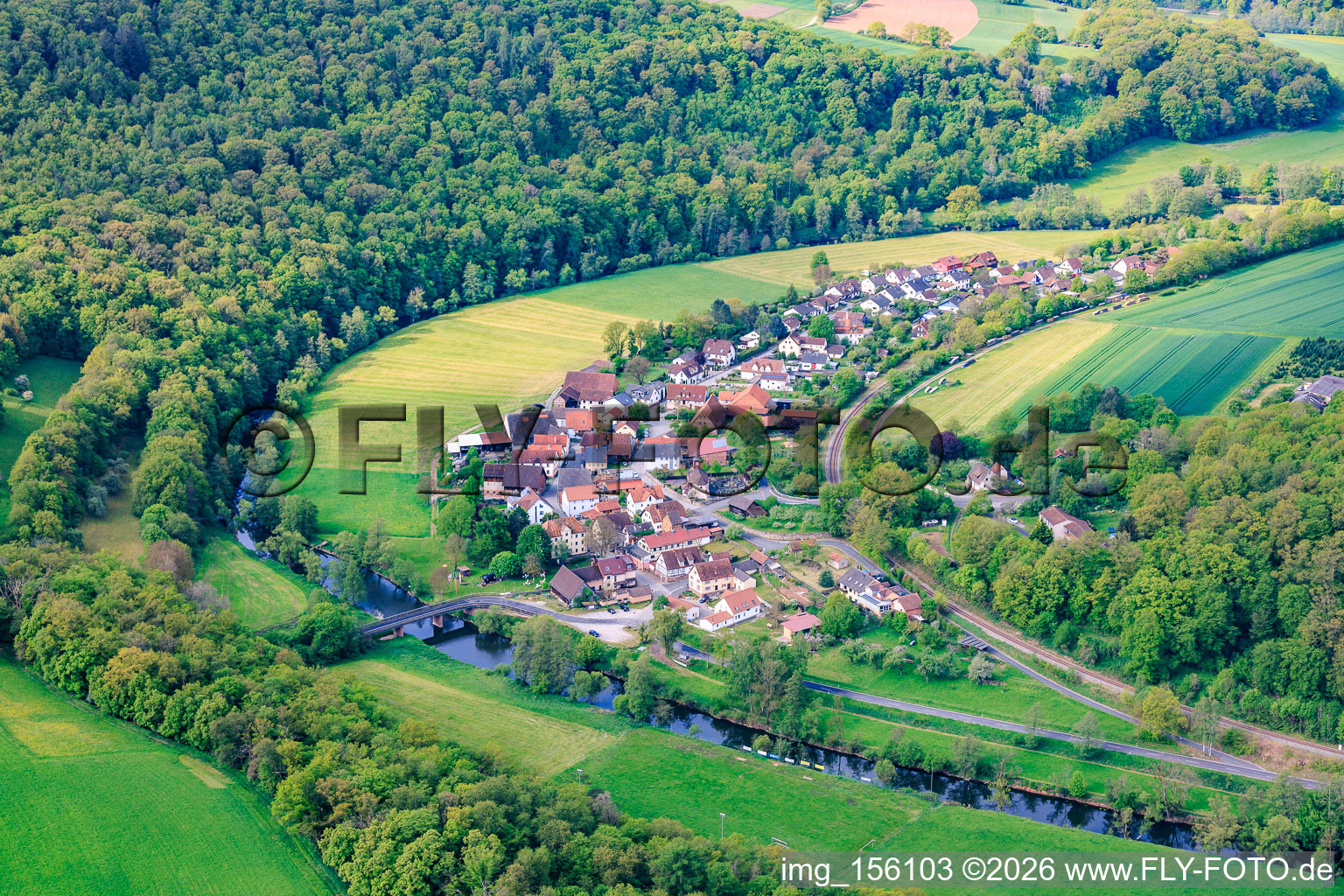 Village view in the valley of the Franconian Saale from the northeast in the district Morlesau in Hammelburg in the state Bavaria, Germany