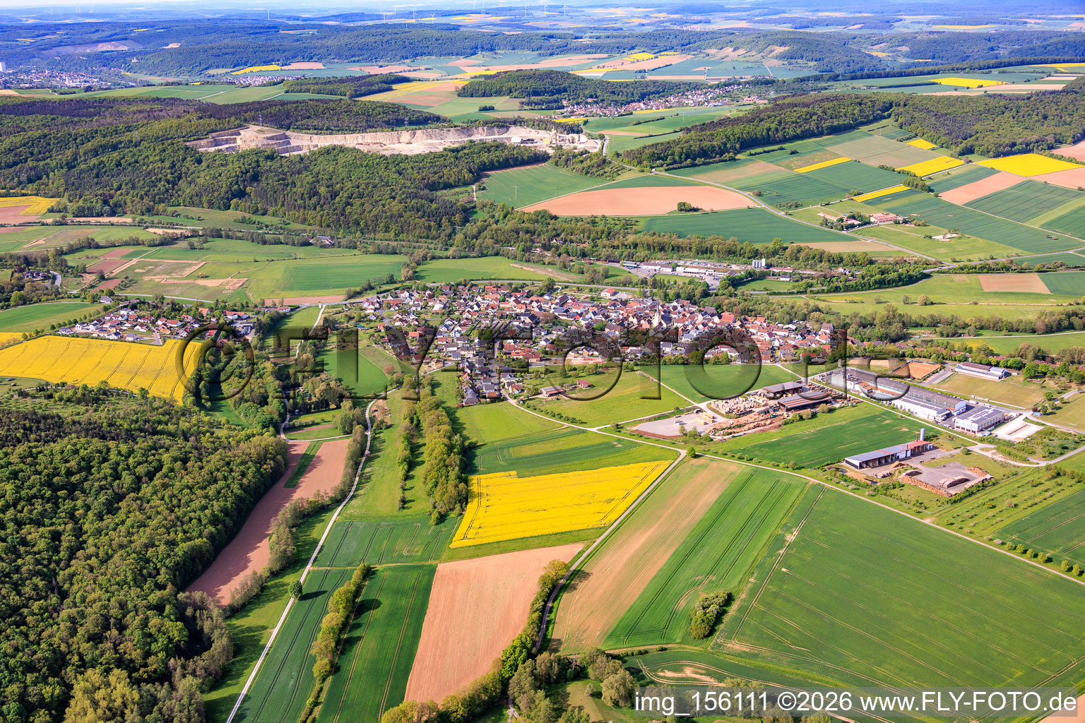 Village view from the northeast with Systec System Anlagetechnik GmbH & Co.KG in Gössenheim in the state Bavaria, Germany