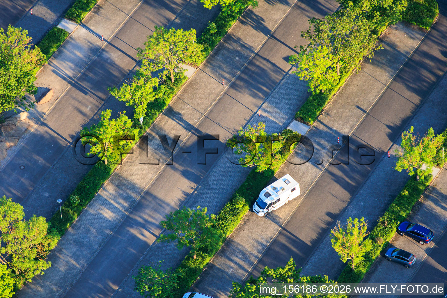 Parking lot of the town hall, swimming pool and sports facilities on Konrad-Lerch-Ring in Offenbach an der Queich in the state Rhineland-Palatinate, Germany