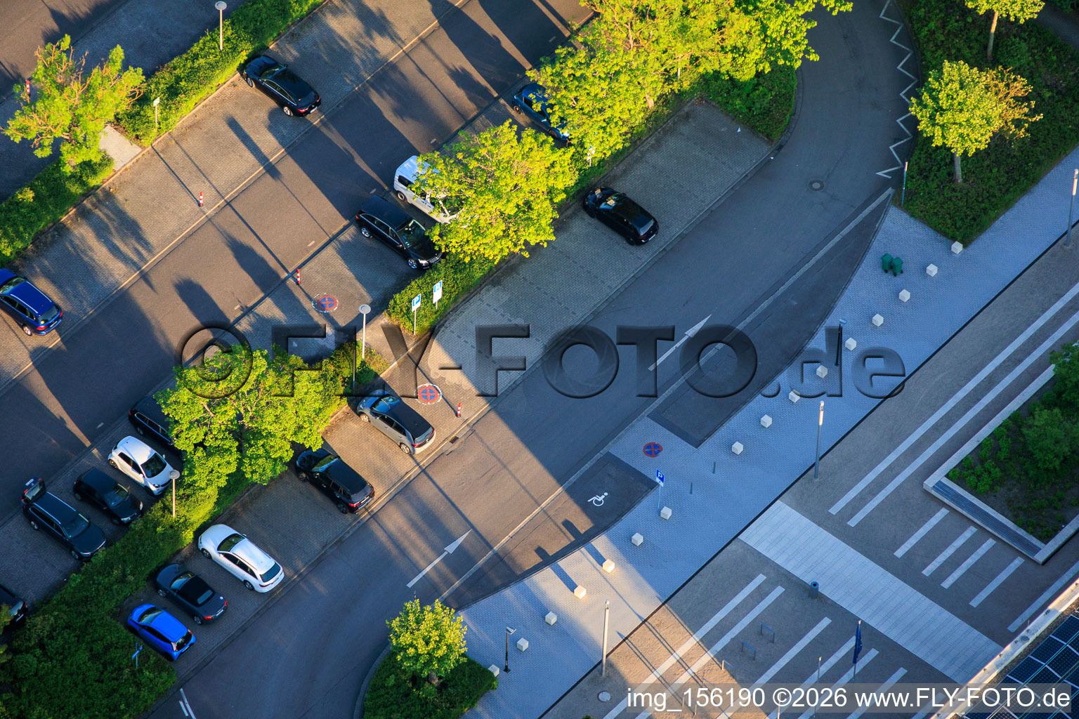 Parking lot of the town hall, swimming pool and sports facilities on Rathausweg in Offenbach an der Queich in the state Rhineland-Palatinate, Germany