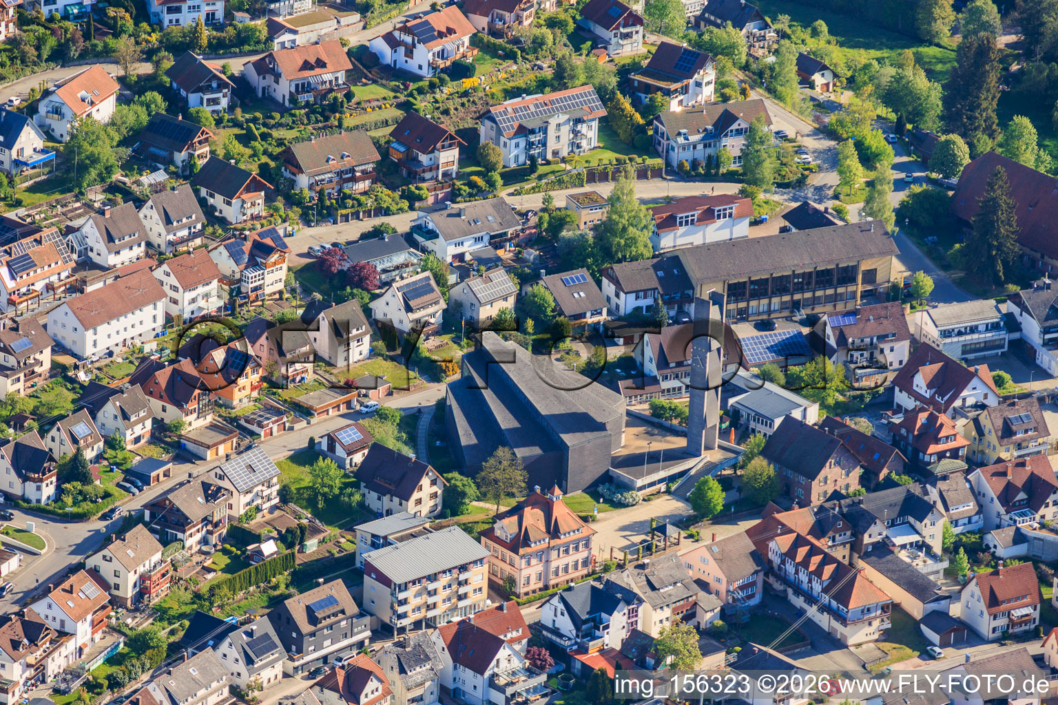 Main street with St. John the Baptist Church in the district Tennenbronn in Schramberg in the state Baden-Wuerttemberg, Germany