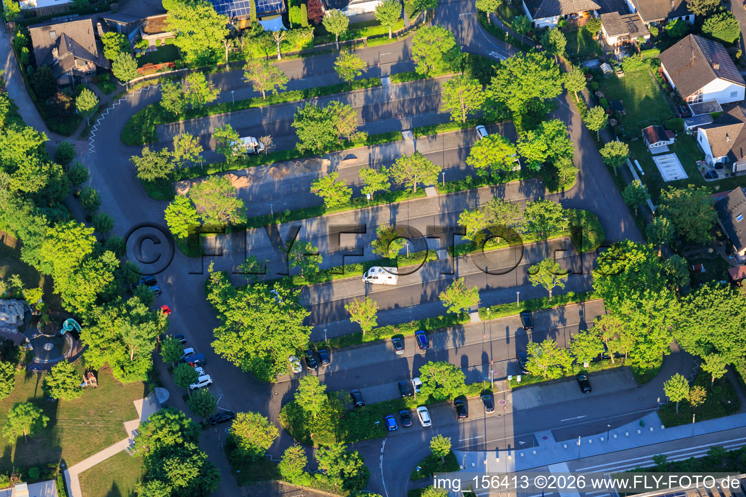 Parking lot of the town hall, swimming pool and sports facilities on Konrad-Lerch-Ring in Offenbach an der Queich in the state Rhineland-Palatinate, Germany