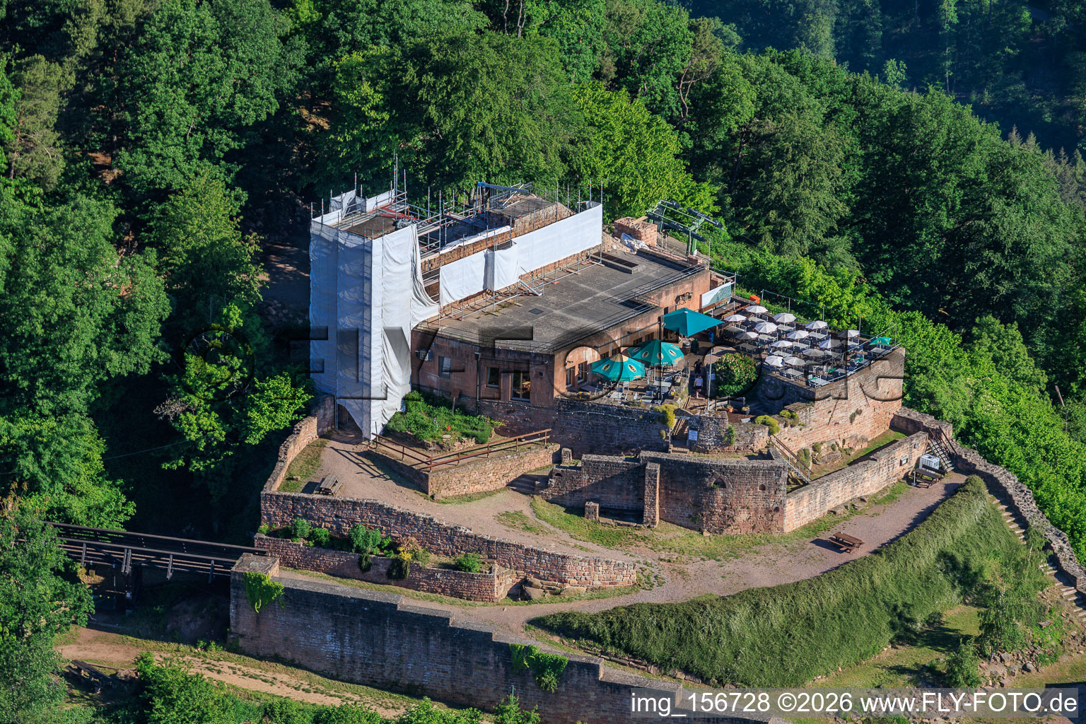 Rietburg castle ruins with scaffolded tower in Rhodt unter Rietburg in the state Rhineland-Palatinate, Germany