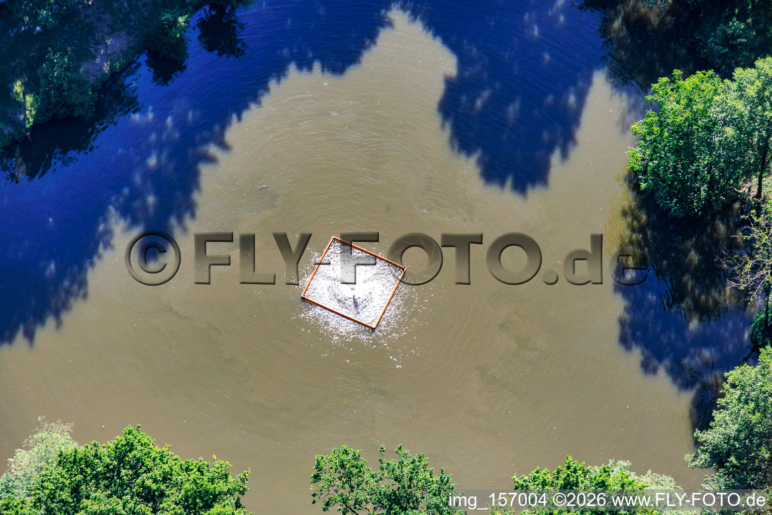 Aerating the fishing pond/police pond in Kandel in the state Rhineland-Palatinate, Germany