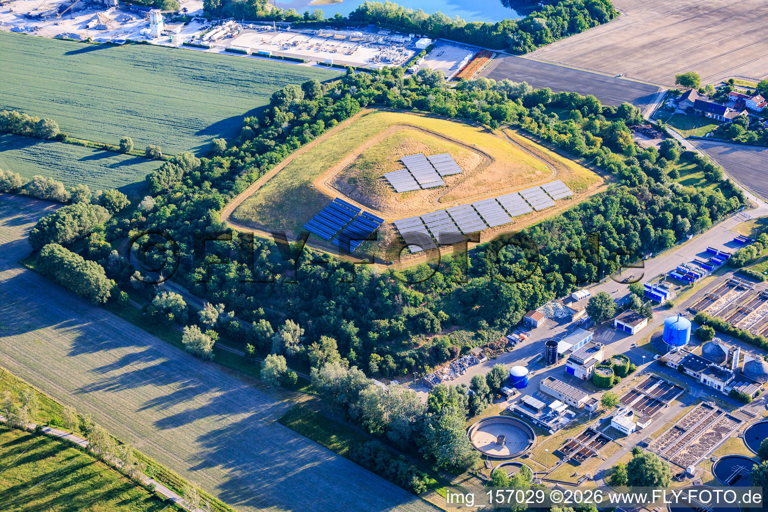 Greened landfill with PV system at the sewage treatment plant Speyer in the district Ludwigshof in Speyer in the state Rhineland-Palatinate, Germany