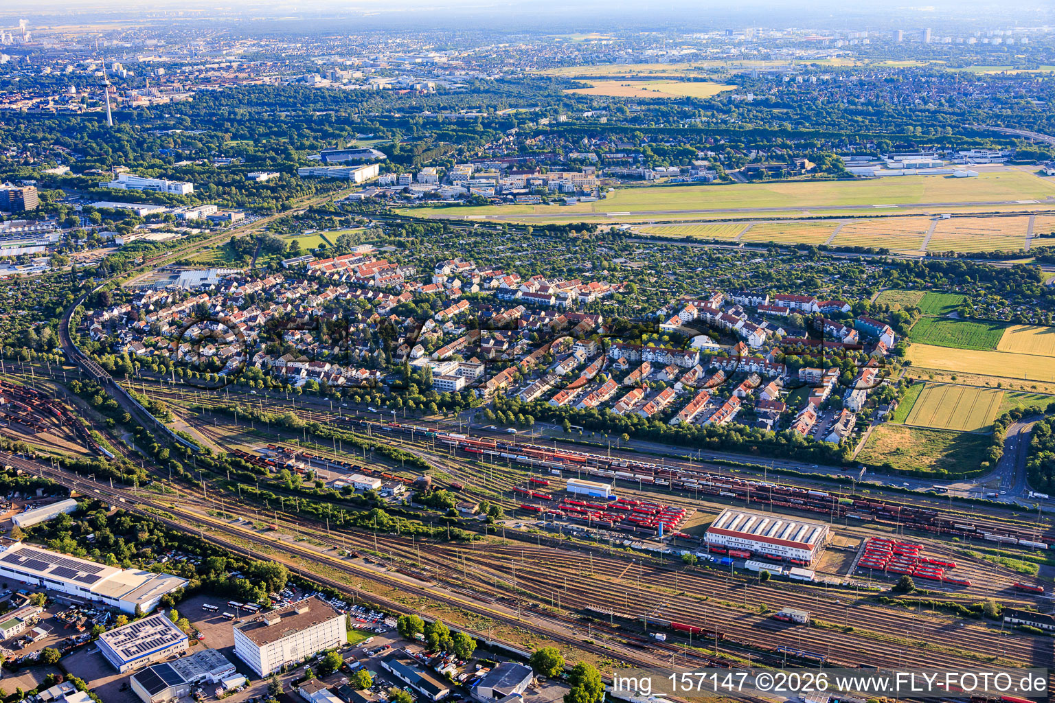 View of the town from the south, beyond the marshalling yard in the district Neuhermsheim in Mannheim in the state Baden-Wuerttemberg, Germany