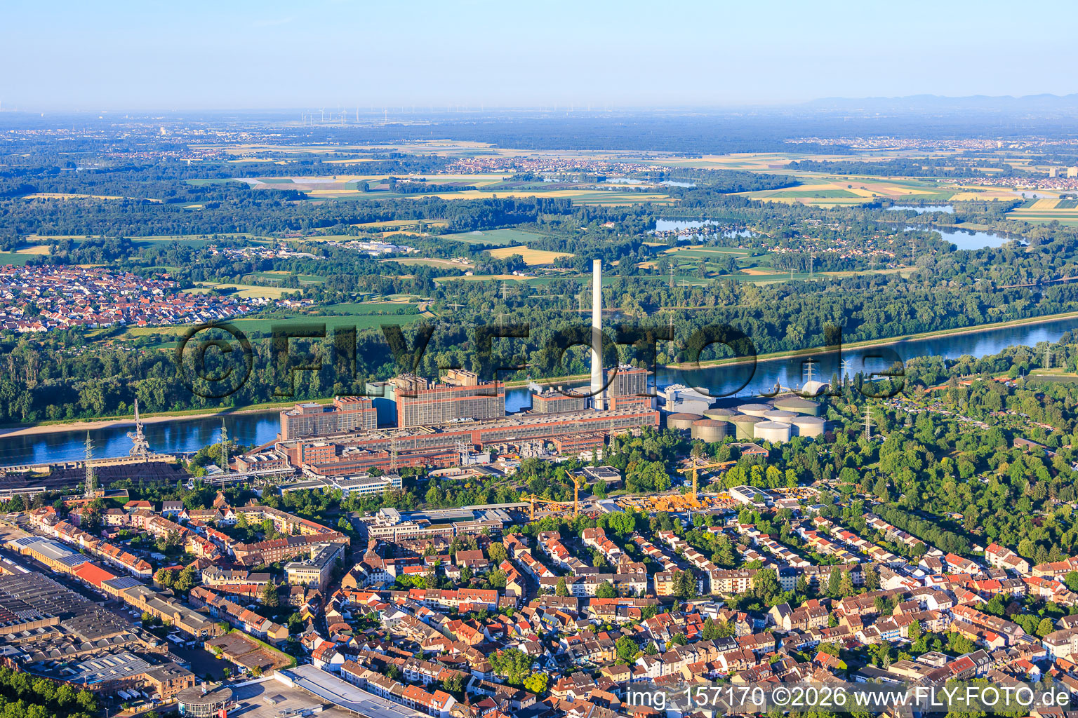 View of the district from the north, extending to the GKM power plant on the Rhine from the north in the district Neckarau in Mannheim in the state Baden-Wuerttemberg, Germany