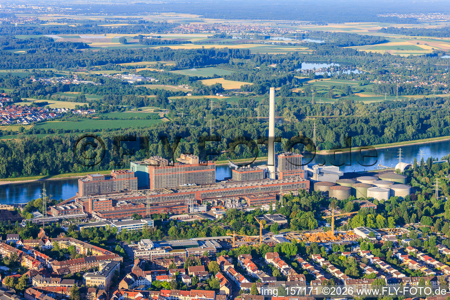 View of the district from the north, extending to the GKM power plant on the Rhine from the north in the district Neckarau in Mannheim in the state Baden-Wuerttemberg, Germany