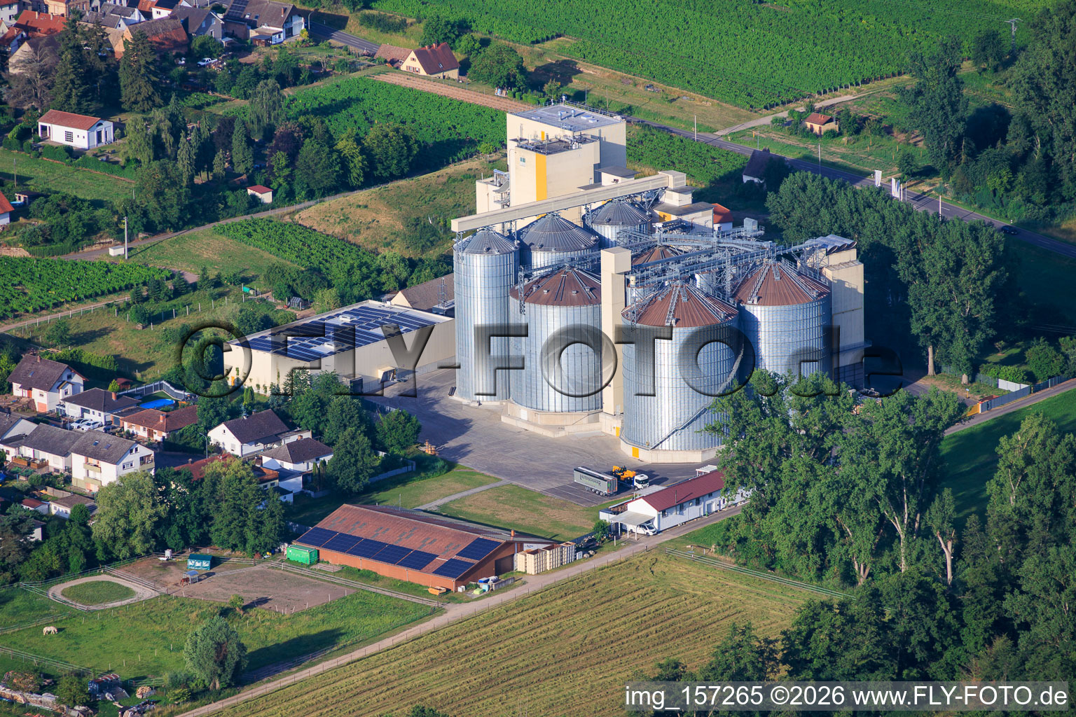 Silos and production buildings of the Cornexo GmbH mill from the northeast in Freimersheim in the state Rhineland-Palatinate, Germany