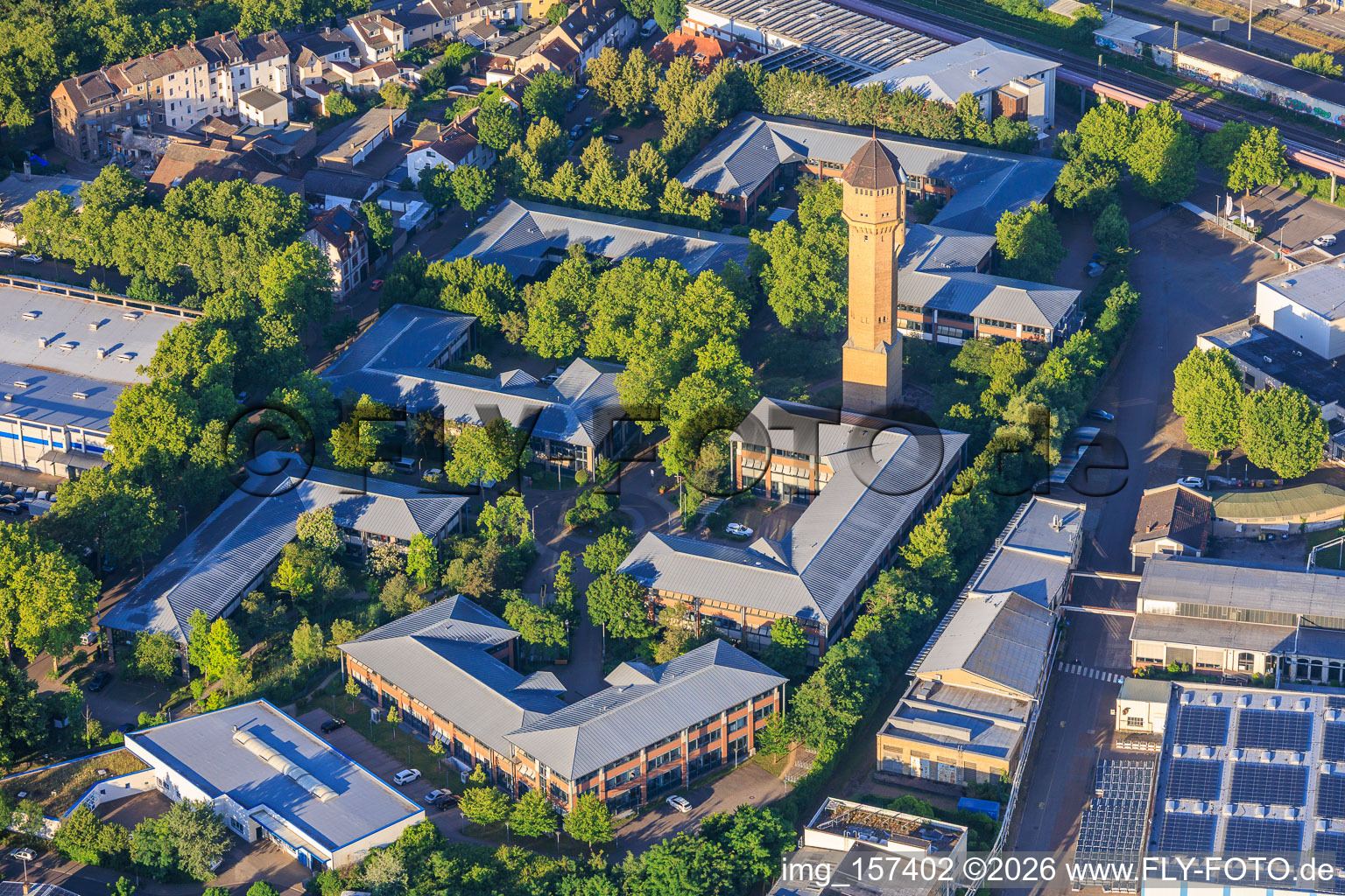 The Plant High-Tech Park Mannheim and Carlo Schmid School Mannheim with Historic Water Tower, Schildkröt Company in the district Neckarau in Mannheim in the state Baden-Wuerttemberg, Germany