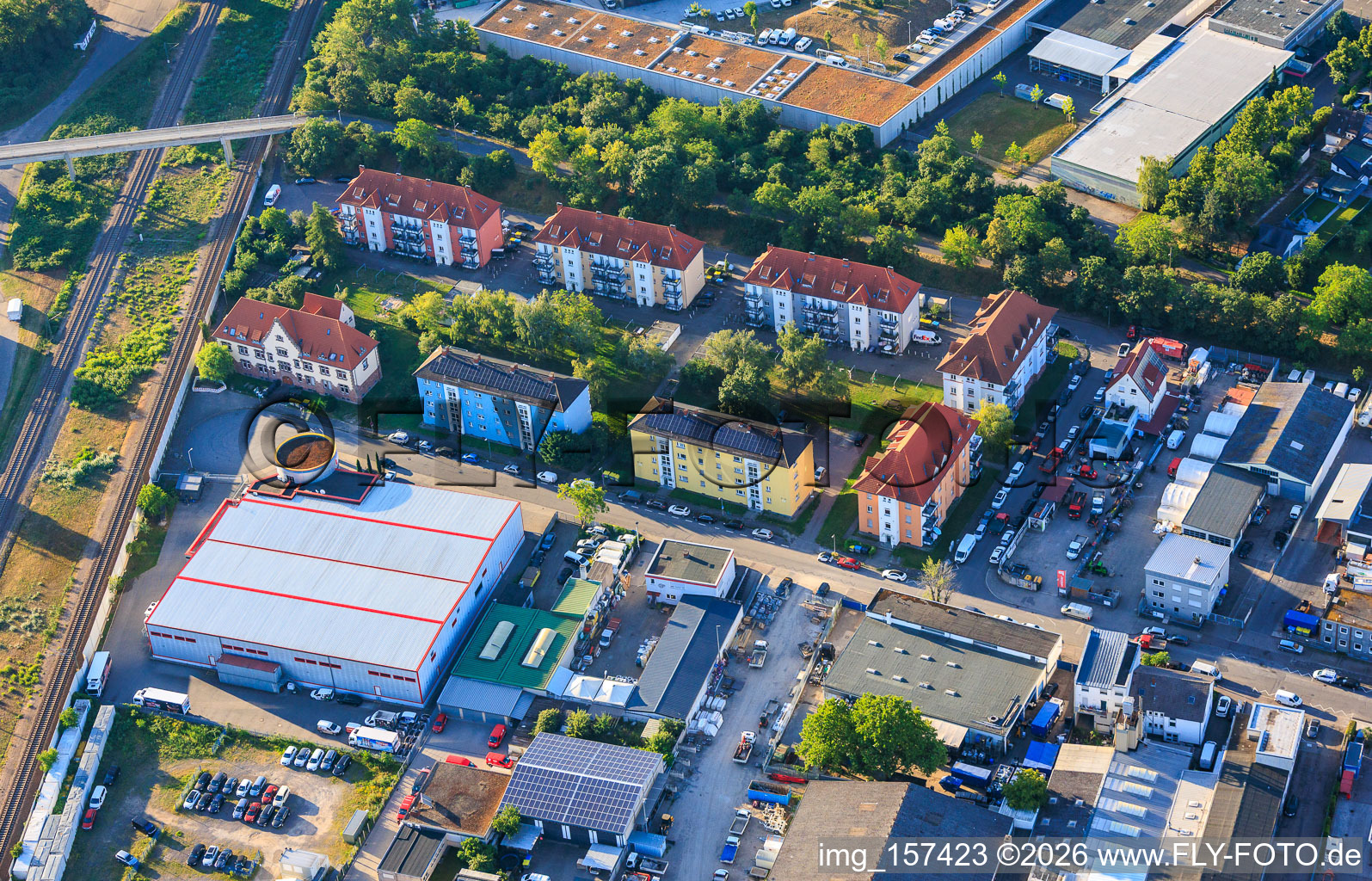 Residential developments and Pepperl+Fuchs Vertrieb Deutschland GmbH in Franz-Grashof-Straße from the west in the district Neckarau in Mannheim in the state Baden-Wuerttemberg, Germany