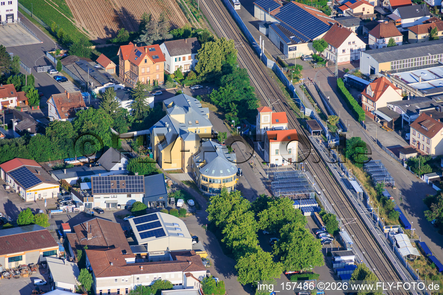 Railway station and commercial building at Bahnhofsplatz with OCLC GmbH in the district Böhl in Böhl-Iggelheim in the state Rhineland-Palatinate, Germany
