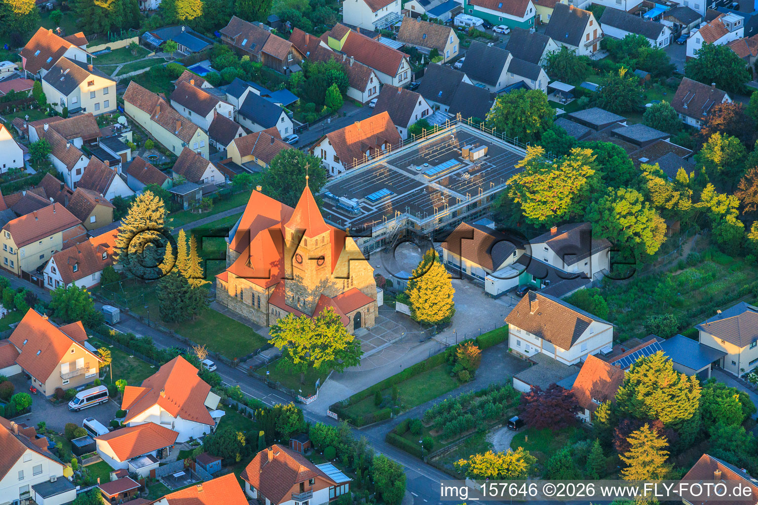 St. Michael's Catholic Church in the last light of evening in Insheim in the state Rhineland-Palatinate, Germany