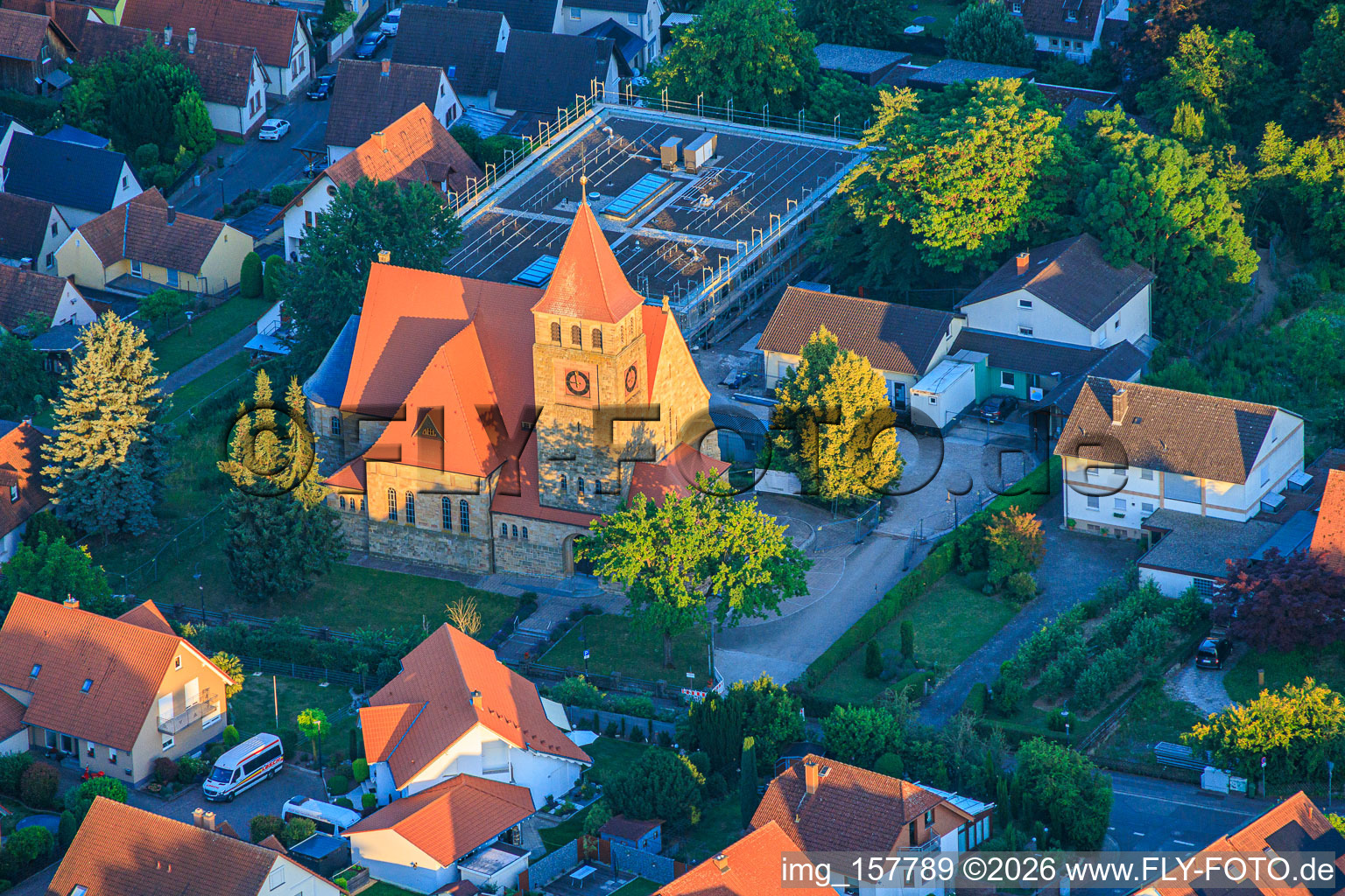 St. Michael's Catholic Church in the last light of evening in Insheim in the state Rhineland-Palatinate, Germany