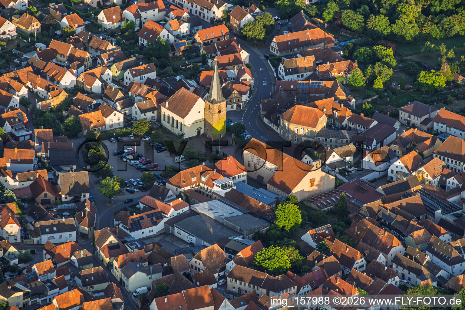 Protestant church in the village center in the evening in the district Godramstein in Landau in der Pfalz in the state Rhineland-Palatinate, Germany