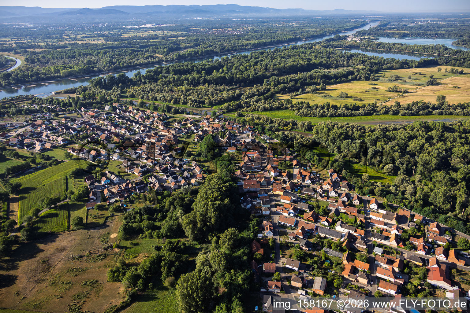 Village view from the northwest at the mouth of the Sauer into the Rhine in Munchhausen in the state Bas-Rhin, France
