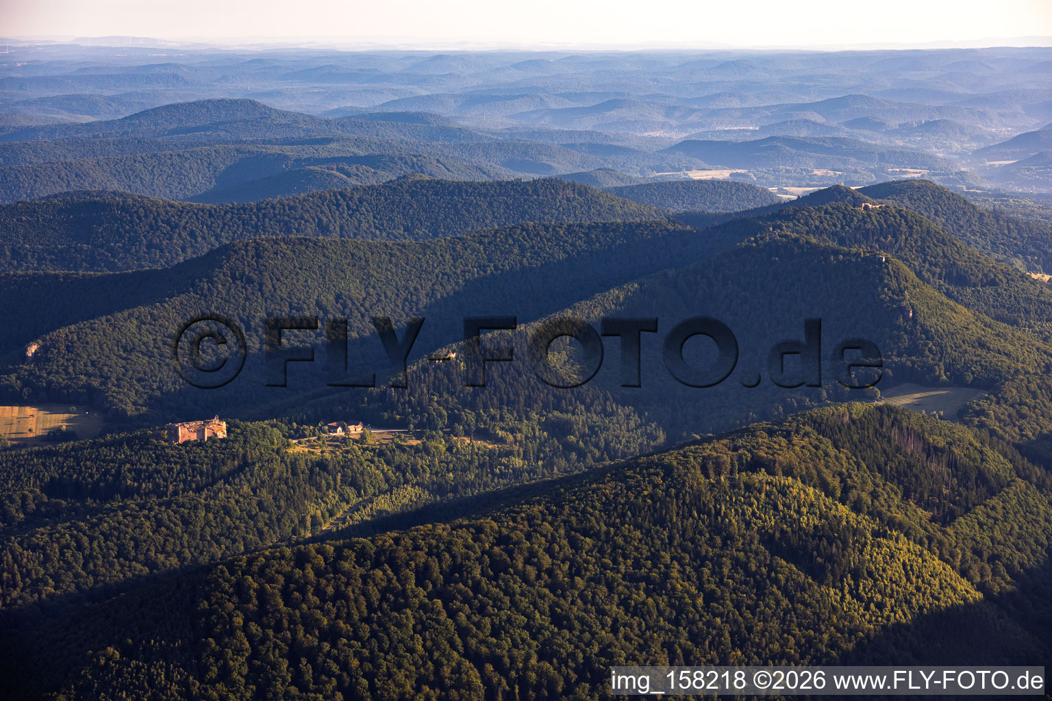The Wasgau region from the south, featuring Fleckenstein Castle and the three castle ruins of Krappenfels, Löwenstein, and Hoheburg in Lembach in the state Bas-Rhin, France