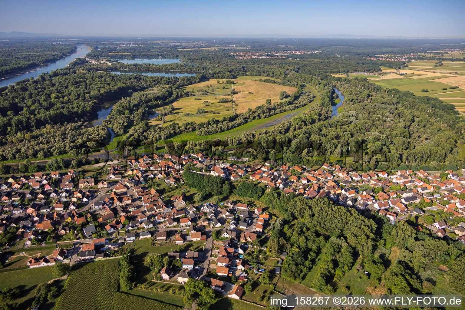 View of the village from the north at the confluence of the Sauer and Rhine rivers in Munchhausen in the state Bas-Rhin, France