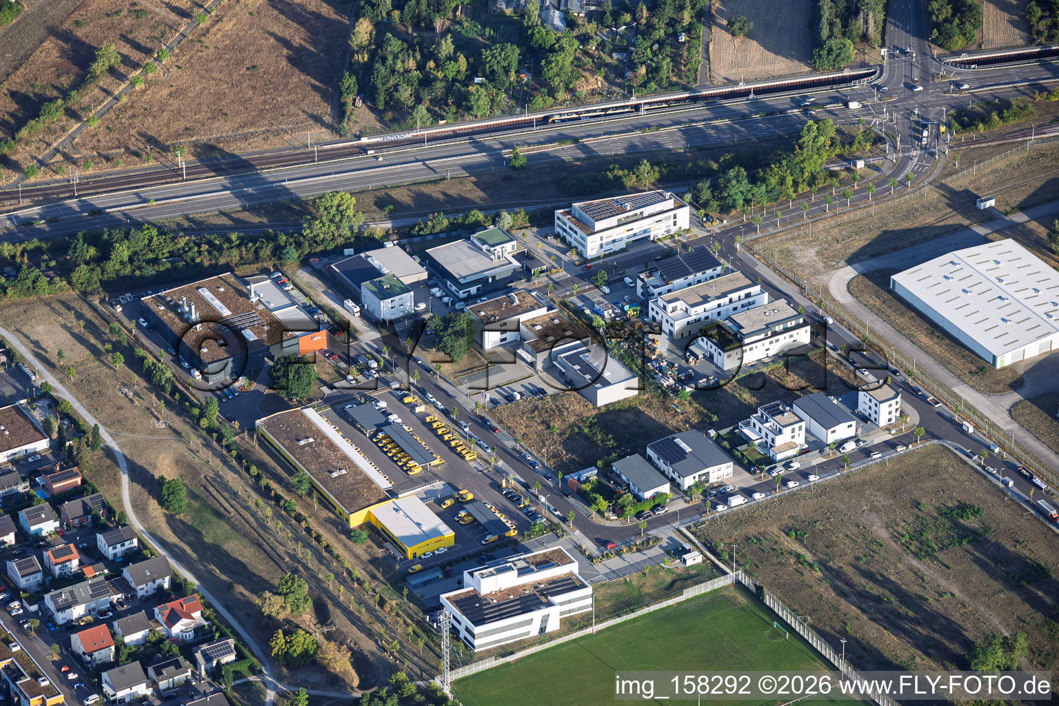 Johann-Georg-Schlosser-Straße industrial park featuring the Deutsche Post delivery base and EBI® Computerlösungen (Michael Ebinger) in the district Neureut in Karlsruhe in the state Baden-Wuerttemberg, Germany