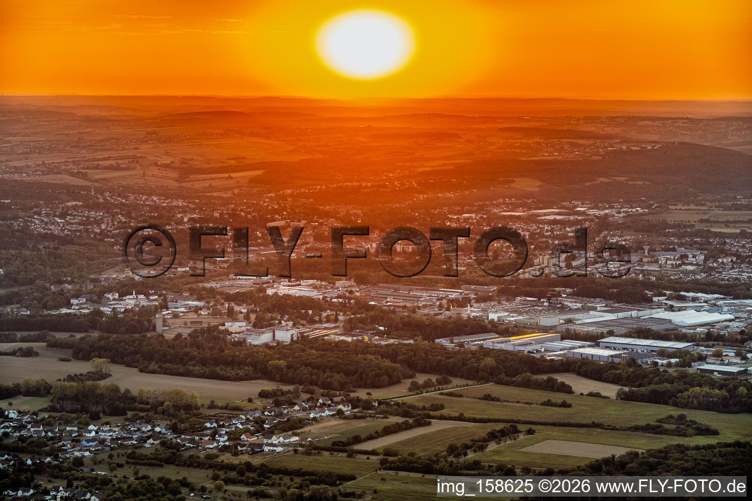 Sunset over Saargemünd in the district Zone Industrielle du Grand Bois Fayencerie in Saargemünd in the state Moselle, France
