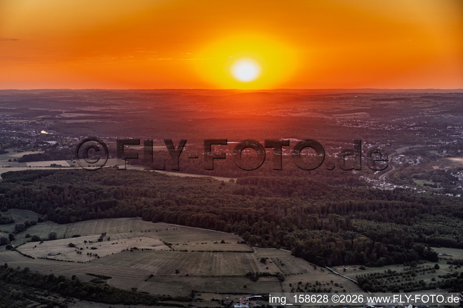 Sunset over Saargemünd in the district Zone Industrielle du Grand Bois Fayencerie in Saargemünd in the state Moselle, France