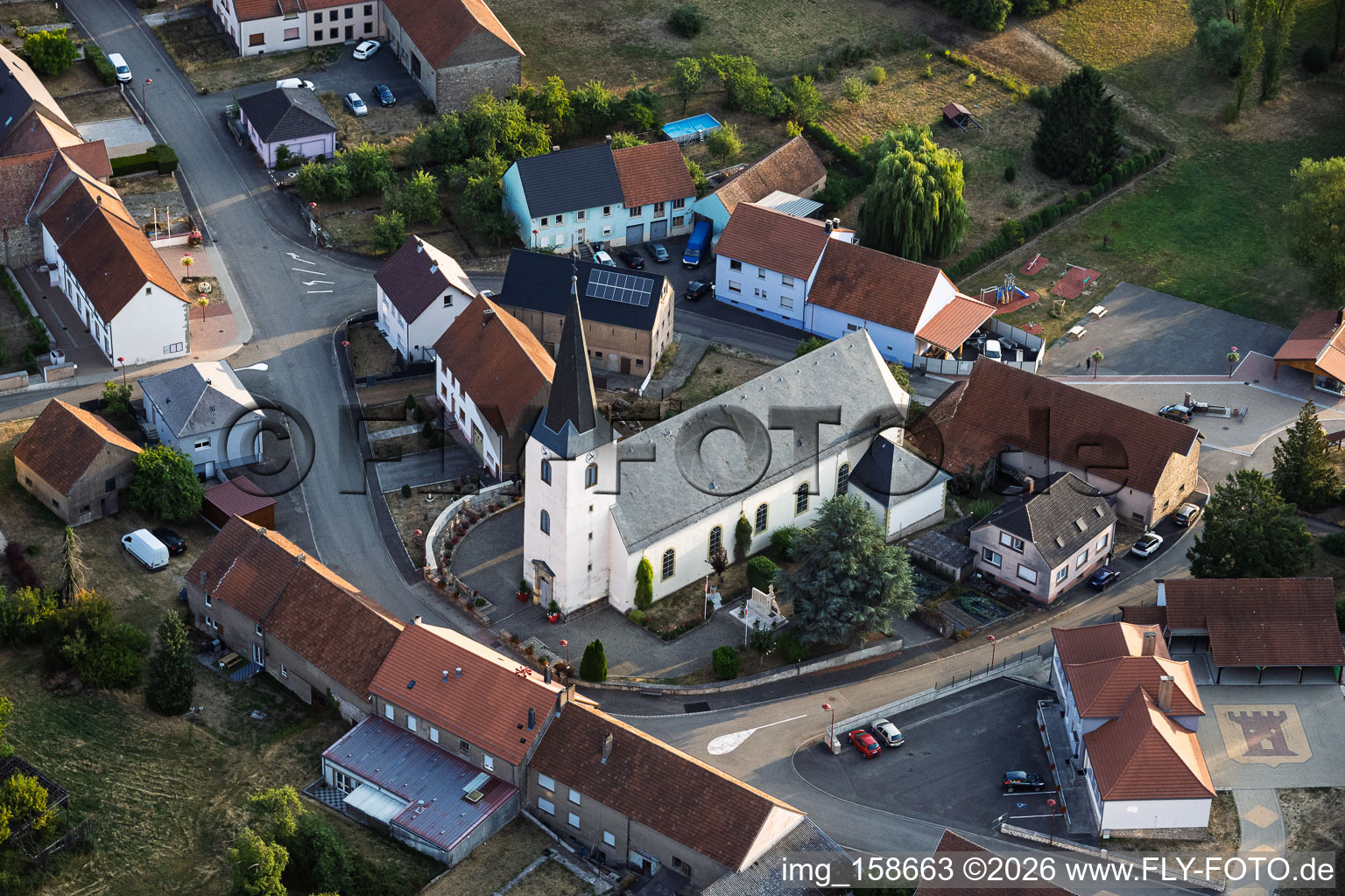 Church in the village center in Rimling in the state Moselle, France