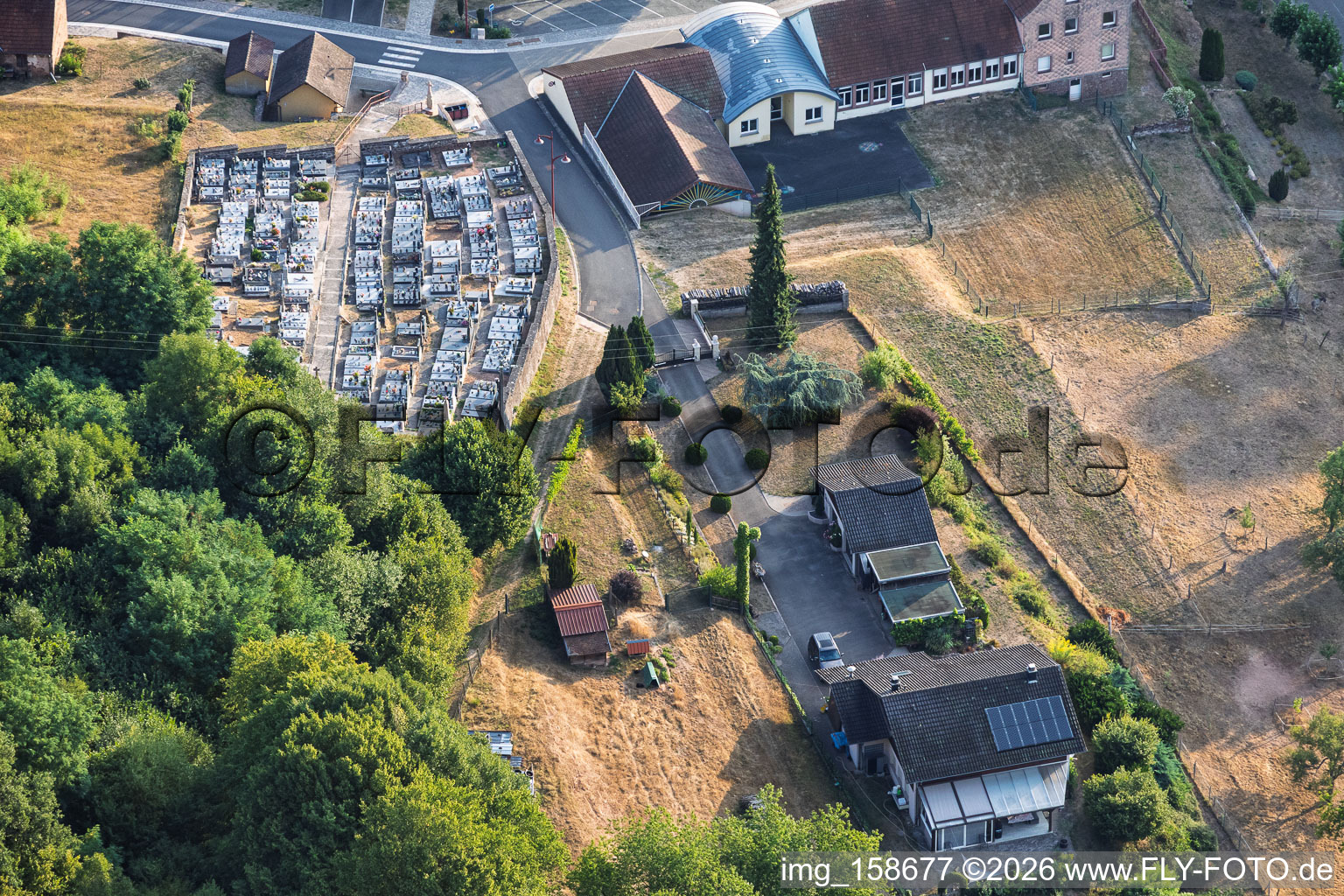 Cemetery on Rue de l'École in Breidenbach in the state Moselle, France