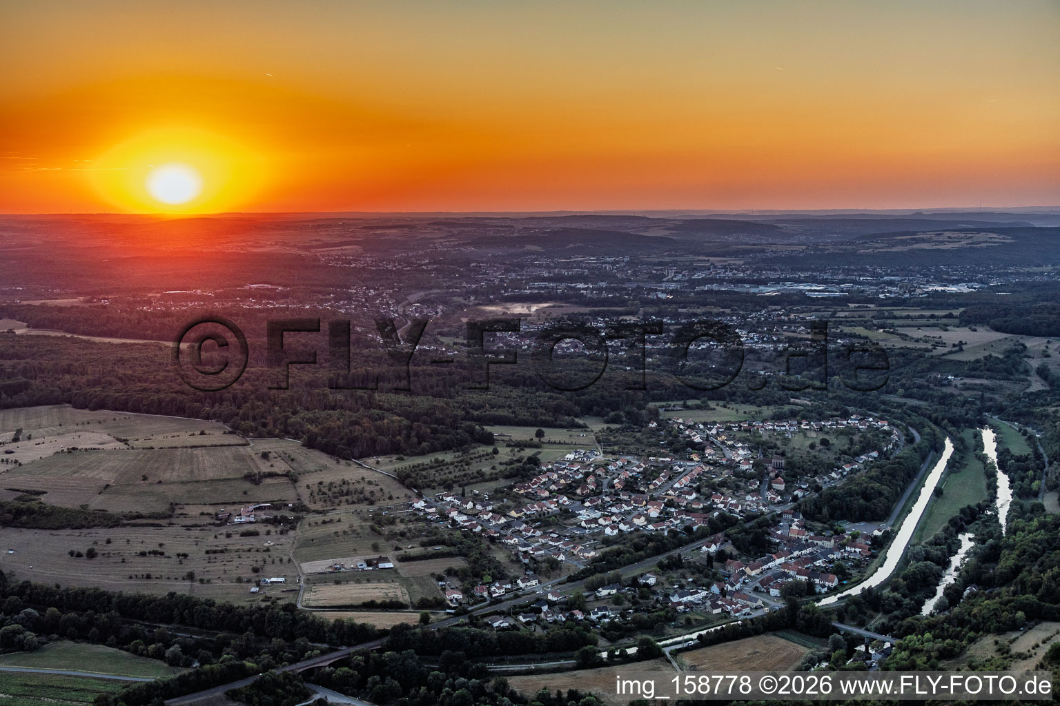 Sunset over the Saar River and Saar Canal in Zetting in the state Moselle, France
