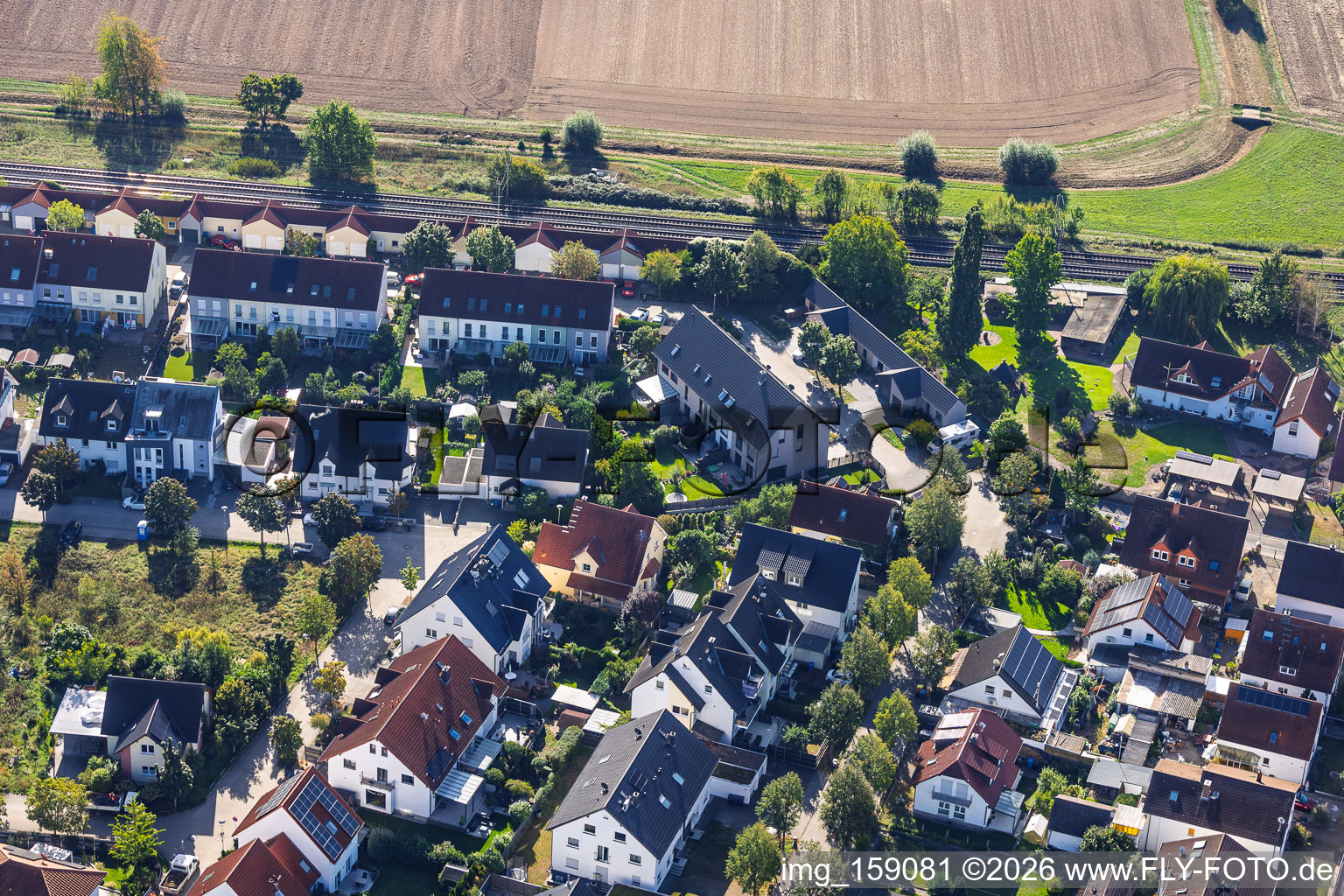Terraced houses on Ginstrstraße by the railway embankment in Babenhausen in the state Hesse, Germany