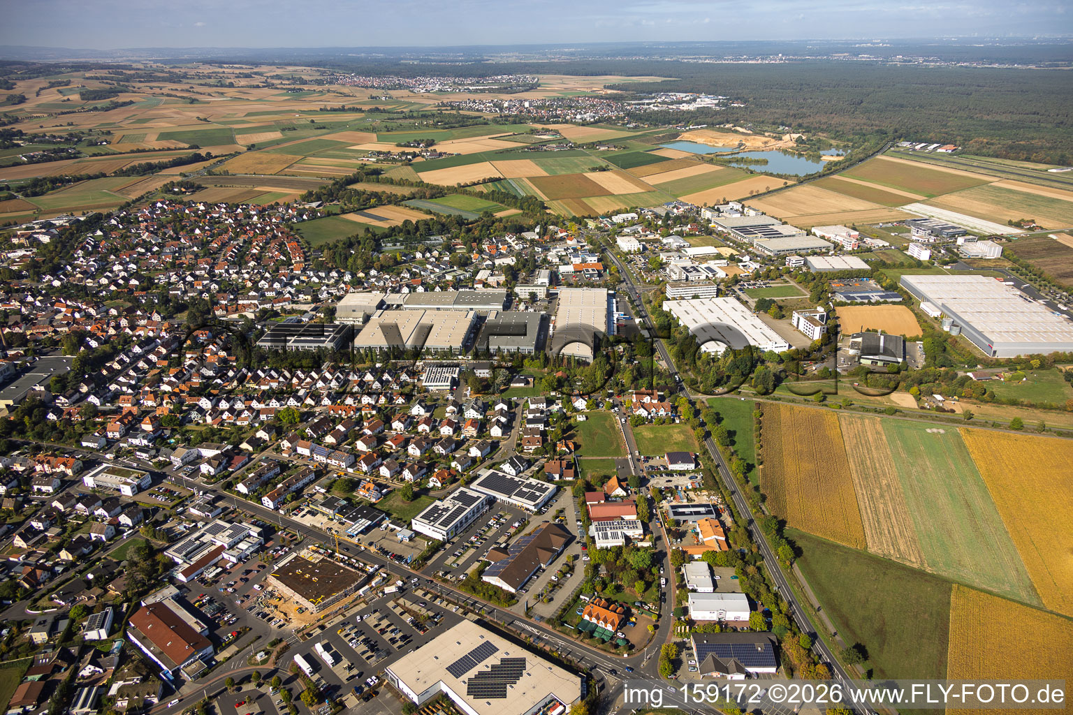 Stockstädter Weg Industrial Park and Industry & Trade Park (view from the east) featuring Kühne + Nagel (AG & Co.) KG, Viking Office Deutschland GmbH, GDC Deutschland GmbH, and VCA Logistik + Services GmbH & Co. KG in Großostheim in the state Bavaria, Germany