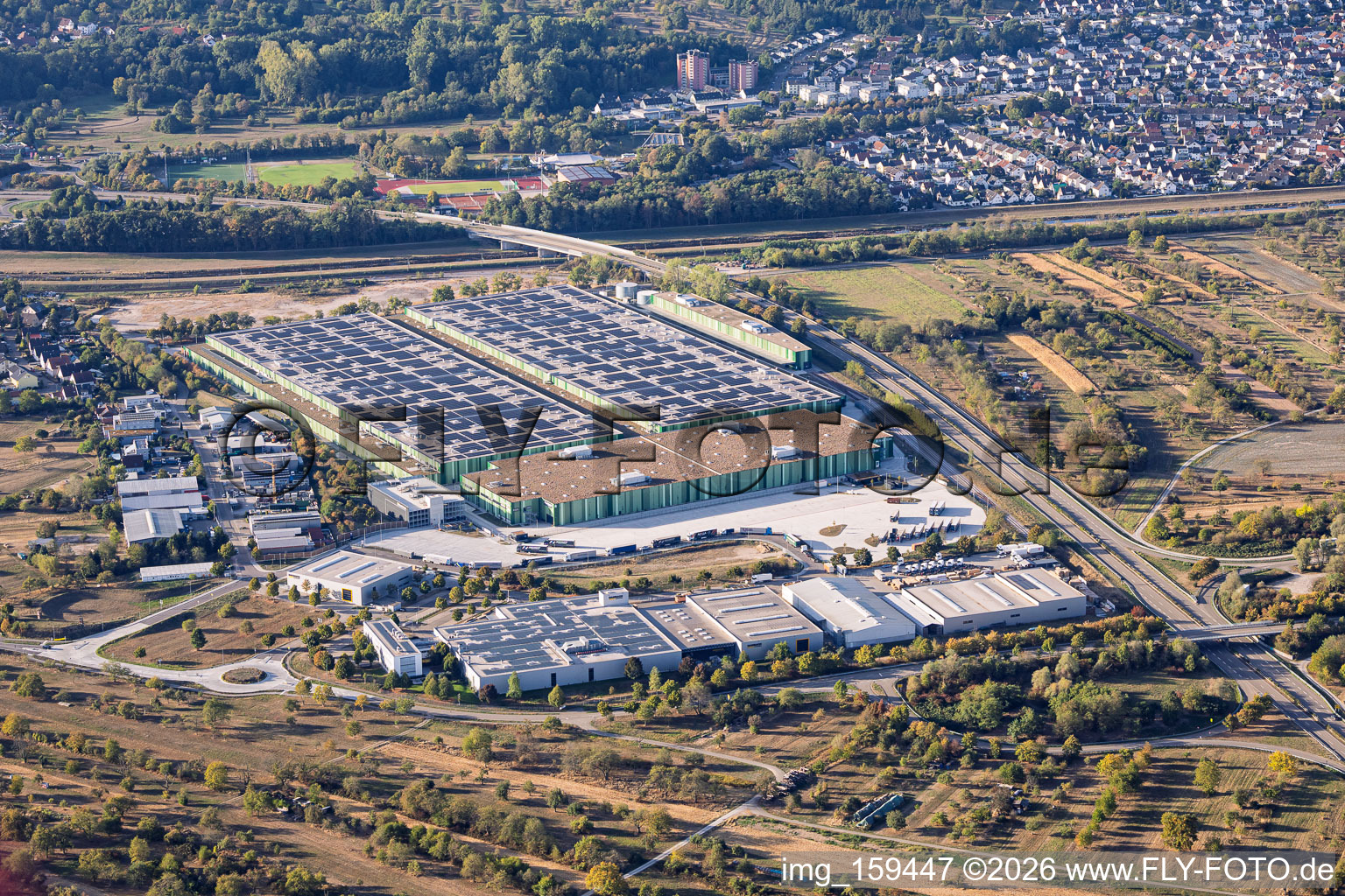 Uchtweide industrial area with Seifert Logistics Group, Mercedes-Benz, Logo-Pack GmbH (export packaging), and Dambach Lagersysteme GmbH & Co. KG in Bischweier in the state Baden-Wuerttemberg, Germany