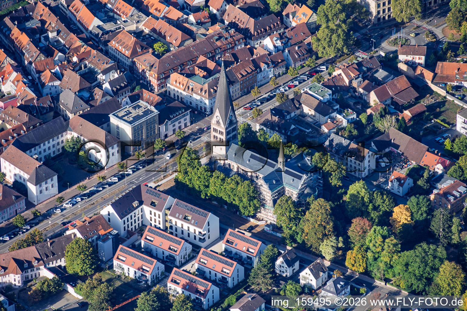 Pforzheimer Straße with Herz-Jesu-Kirche (Church of the Sacred Heart) in Ettlingen in the state Baden-Wuerttemberg, Germany