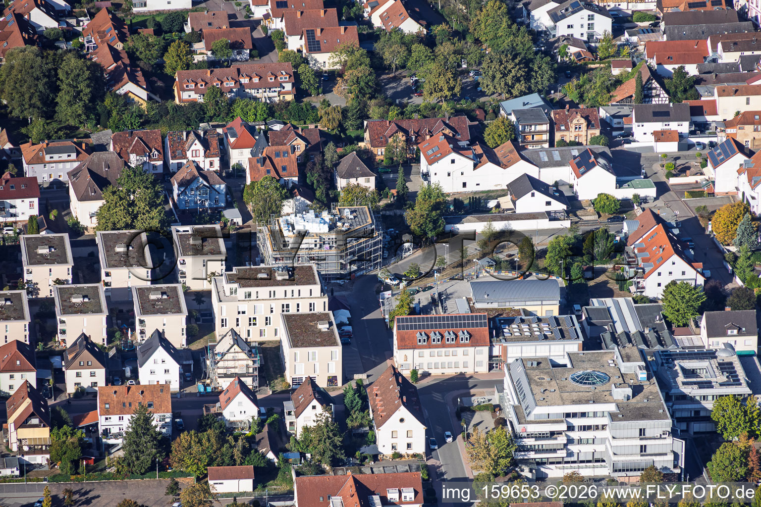 New construction site for 18 condominiums in the town center of Grathwohl. Earthworks, ETNA BAU GmbH and Abbruch GmbH and AK.Bau GmbH. https:// in Kandel in the state Rhineland-Palatinate, Germany
