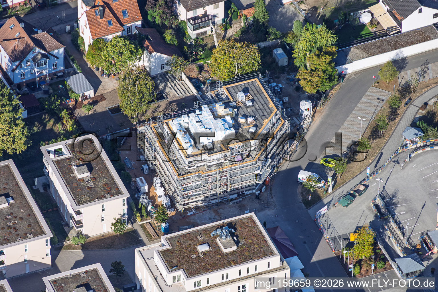 New construction site for 18 condominiums in the town center of Grathwohl. Earthworks, ETNA BAU GmbH and Abbruch GmbH and AK.Bau GmbH. https:// in Kandel in the state Rhineland-Palatinate, Germany