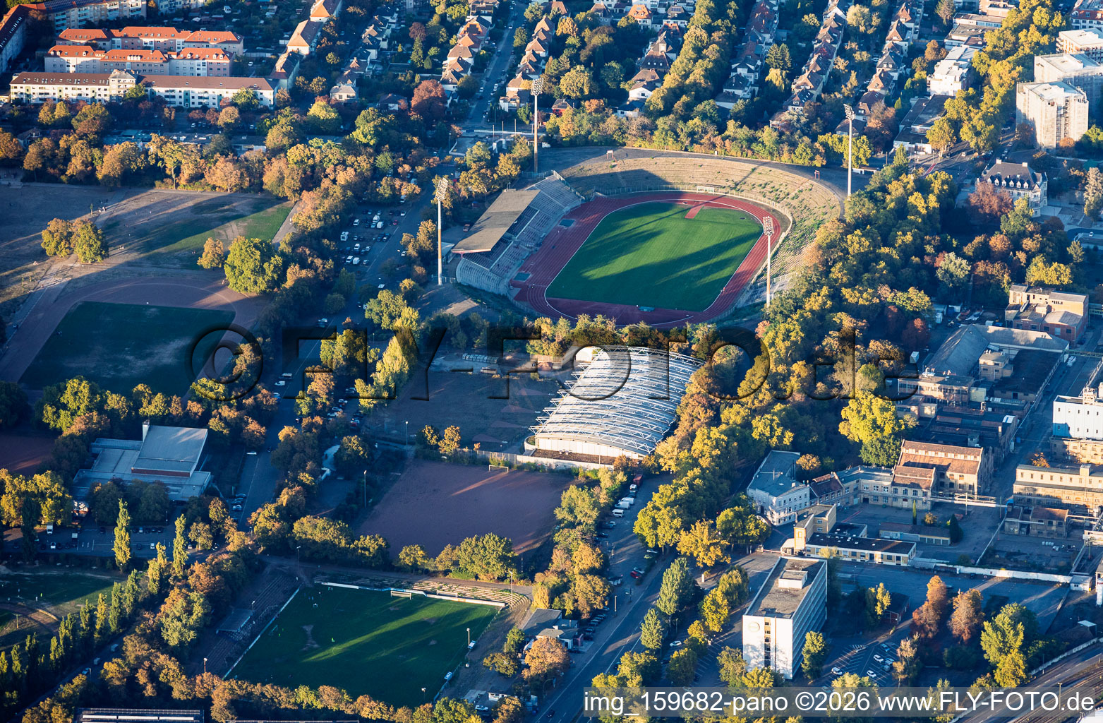 Südweststadion with a stand overgrown by bushes, and Sportpark Südwest in the district Süd in Ludwigshafen in the state Rhineland-Palatinate, Germany