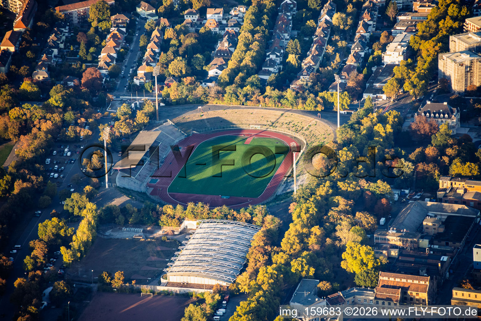 Südweststadion with a stand overgrown by bushes, and Sportpark Südwest in the district Süd in Ludwigshafen in the state Rhineland-Palatinate, Germany