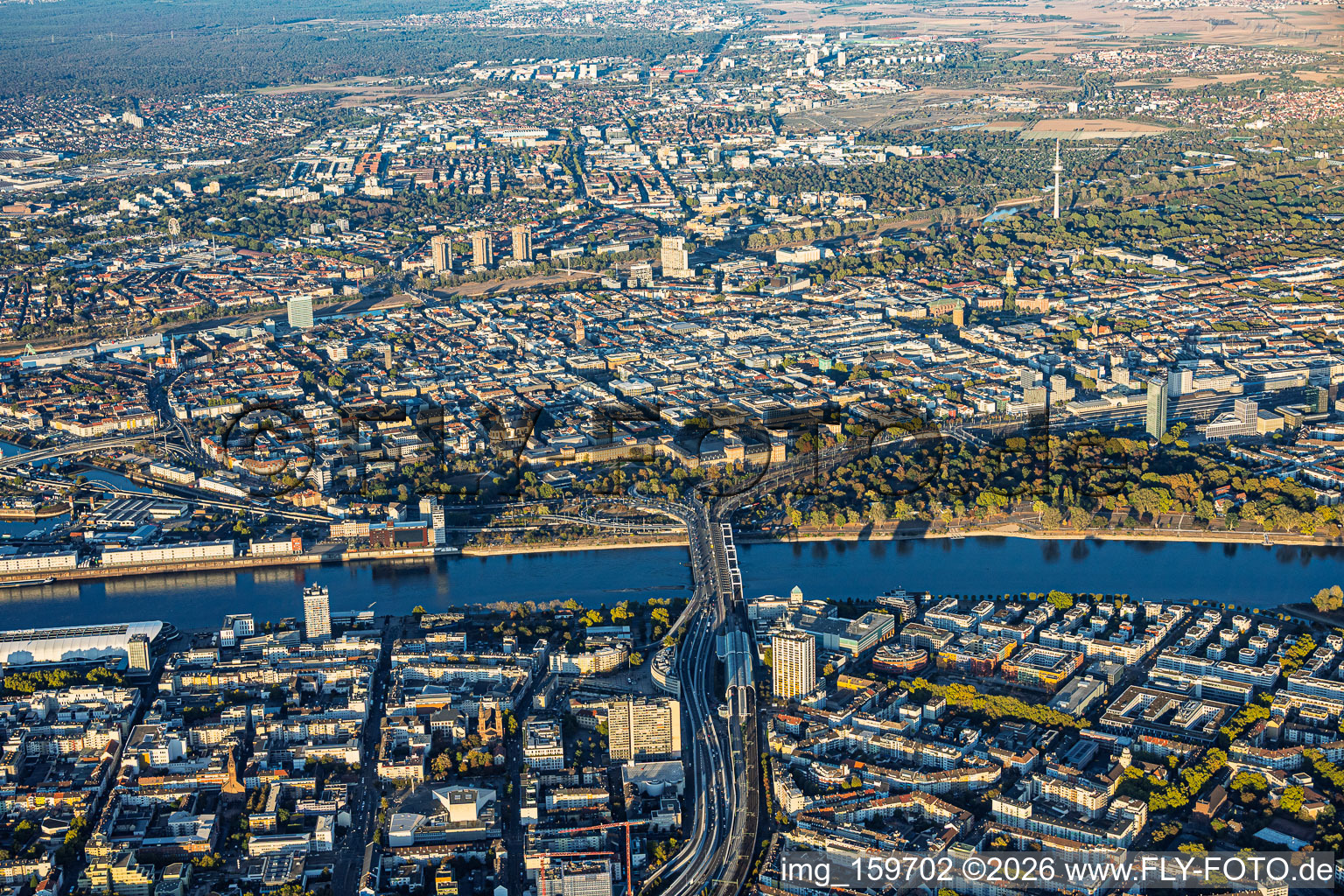 View across the Konrad-Adenauer-Brücke (B37) over the Rhine—from Ludwigshafen to the Neckar—showing the palace and the "Quadrate" (city grid) within the ring road in the district Innenstadt in Mannheim in the state Baden-Wuerttemberg, Germany